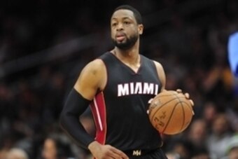 January 11, 2015; Los Angeles, CA, USA; Miami Heat guard Dwyane Wade (3) moves the ball up court against the Los Angeles Clippers during the first half at Staples Center. Mandatory Credit: Gary A. Vasquez-USA TODAY Sports