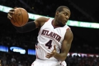 Dec 15, 2014; Atlanta, GA, USA; Atlanta Hawks forward Paul Millsap (4) collects a rebound against the Chicago Bulls during the first half at Philips Arena. Mandatory Credit: Dale Zanine-USA TODAY Sports