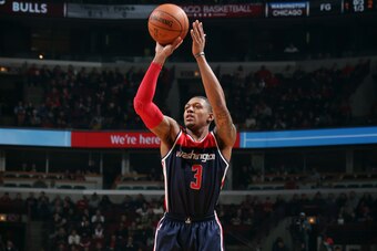 CHICAGO, IL - JANUARY 14: Bradley Beal #3 of the Washington Wizards shoots against the Chicago Bulls on January 14, 2015 at the United Center in Chicago, Illinois. NOTE TO USER: User expressly acknowledges and agrees that, by downloading and or using this