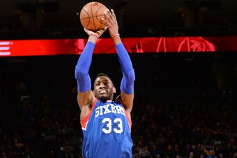 OAKLAND, CA - DECEMBER 30: Robert Covington #33 of the Philadelphia 76ers shoots against the Golden State Warriors during the game on December 30, 2014 at Oracle Arena in Oakland, California. NOTE TO USER: User expressly acknowledges and agrees that, by d