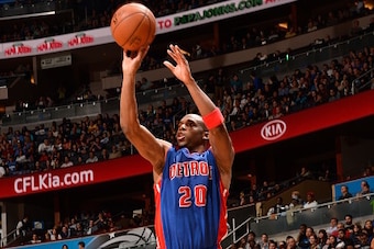 ORLANDO, FL - DECEMBER 30:  Jodie Meeks #20 of the Detroit Pistons shoots against Ben Gordon #7 of the Orlando Magic on December 30, 2014 at Amway Center in Orlando, Florida. NOTE TO USER: User expressly acknowledges and agrees that, by downloading and or