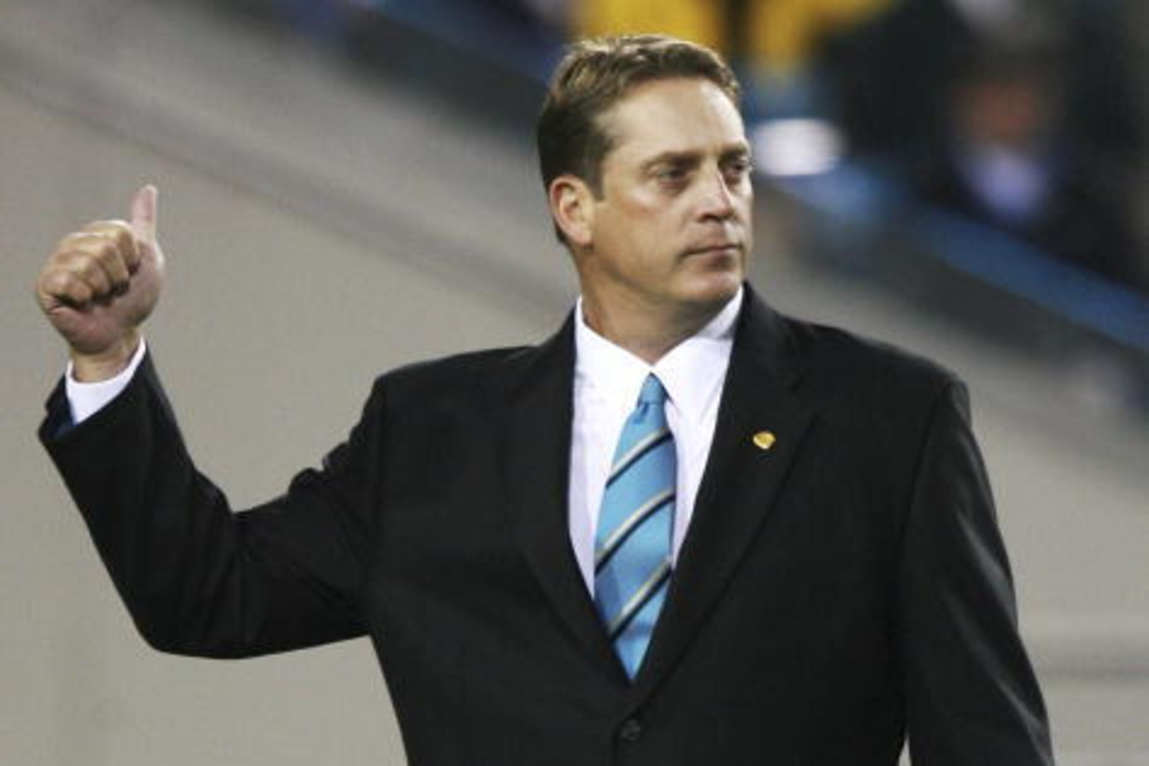 JACKSONVILLE, FL - NOVEMBER 20:  Head coach Jack Del Rio of the Jacksonville Jaguars gives some fans a thumbs-up prior to taking on the New York Giants at Alltel Stadium on November 20, 2006 in Jacksonville, Florida. Del Rio received special permission fr