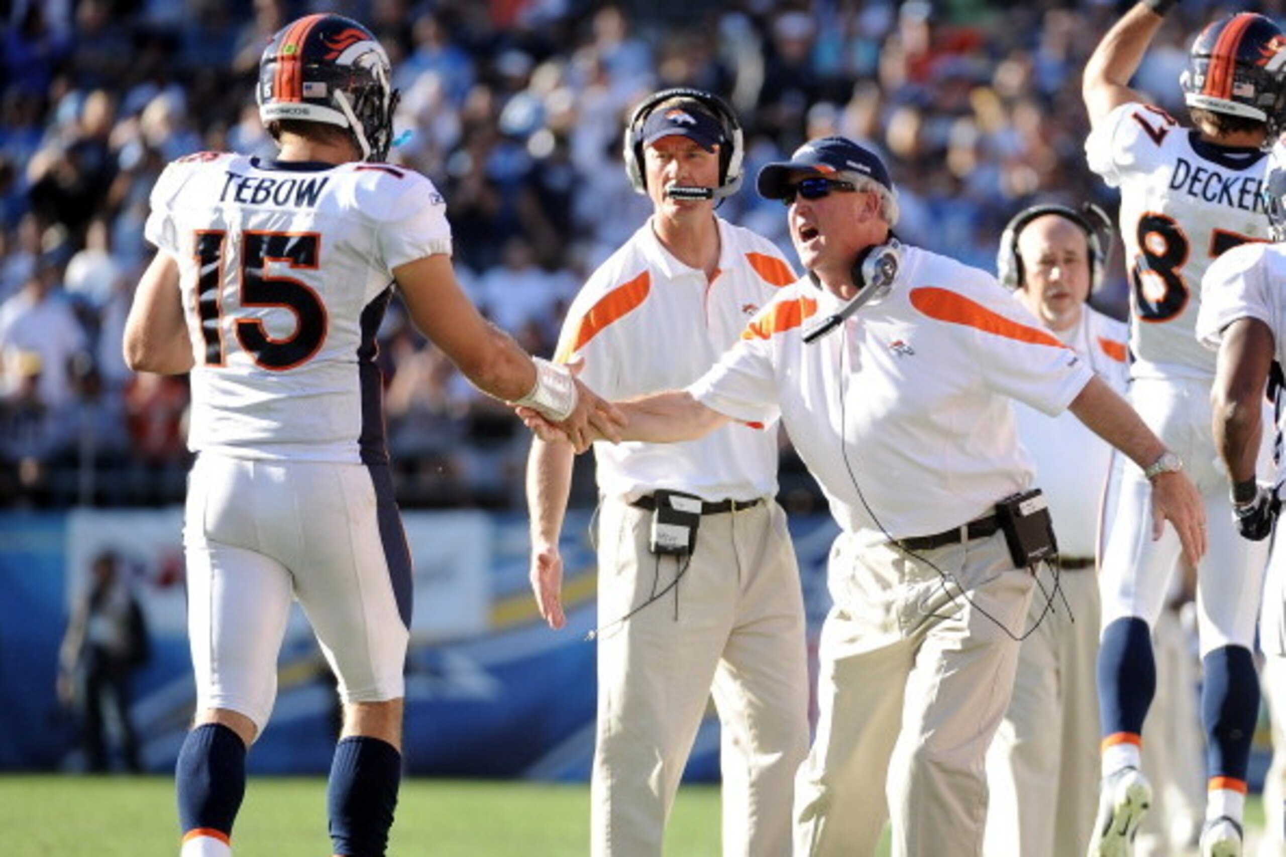SAN DIEGO, CA - NOVEMBER 27:  Head coach John Fox of the Denver Broncos celebrates a touchdown with Tim Tebow #15 to trail 10-7 to the San Diego Chargers during the second quarter at Qualcomm Stadium on November 27, 2011 in San Diego, California.  (Photo 