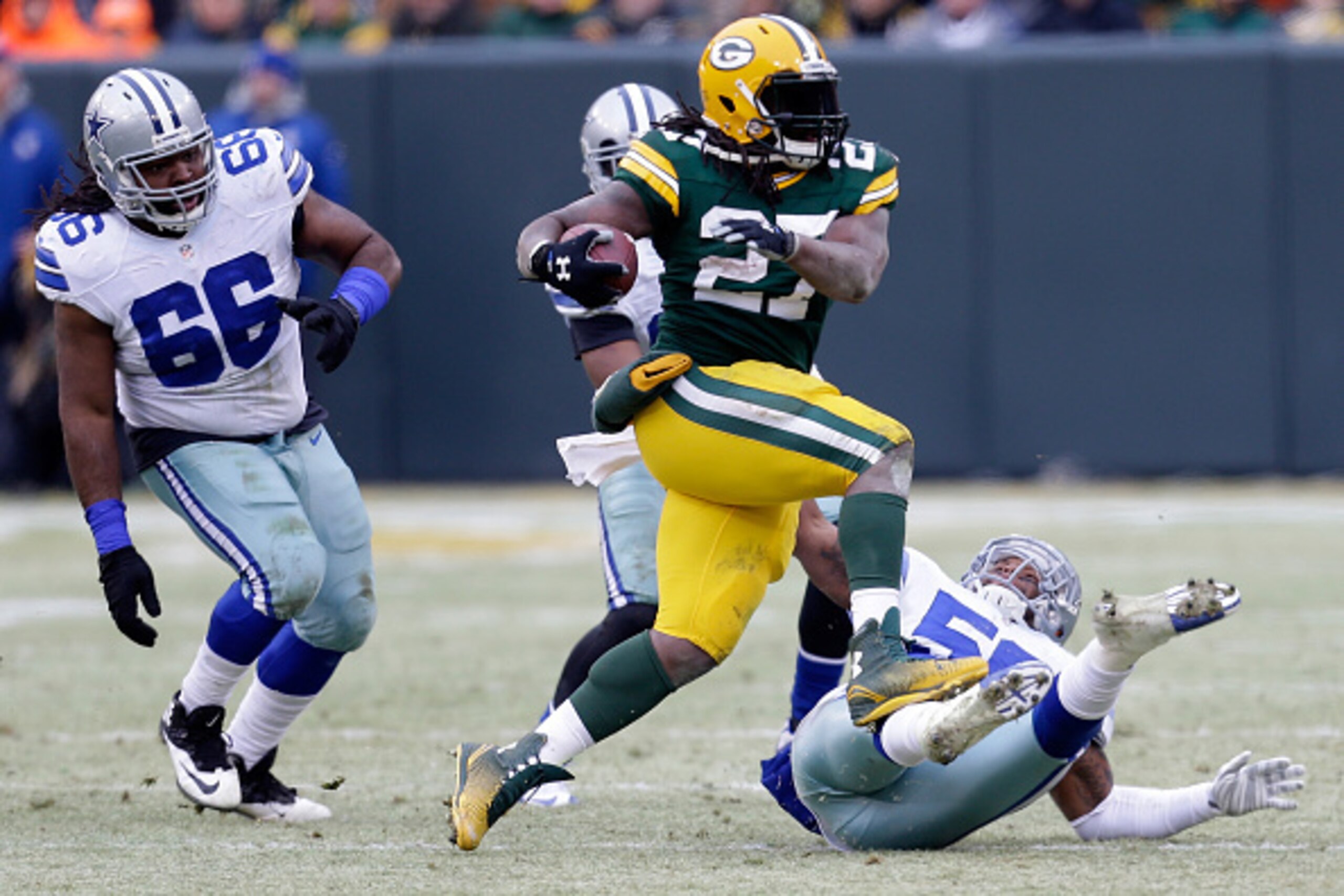 GREEN BAY, WI - JANUARY 11:   Eddie Lacy #27 of the Green Bay Packers carries the football against the Dallas Cowboys during the 2015 NFC Divisional Playoff game at Lambeau Field on January 11, 2015 in Green Bay, Wisconsin.  The Green Bay Packers defeat t