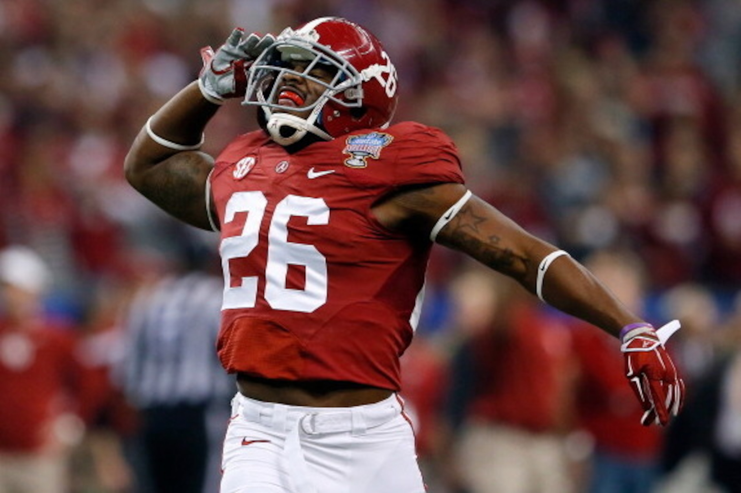 NEW ORLEANS, LA - JANUARY 02:  Landon Collins #26 of the Alabama Crimson Tide celebrates after intercepting the ball against the Oklahoma Sooners during the Allstate Sugar Bowl at the Mercedes-Benz Superdome on January 2, 2014 in New Orleans, Louisiana.  