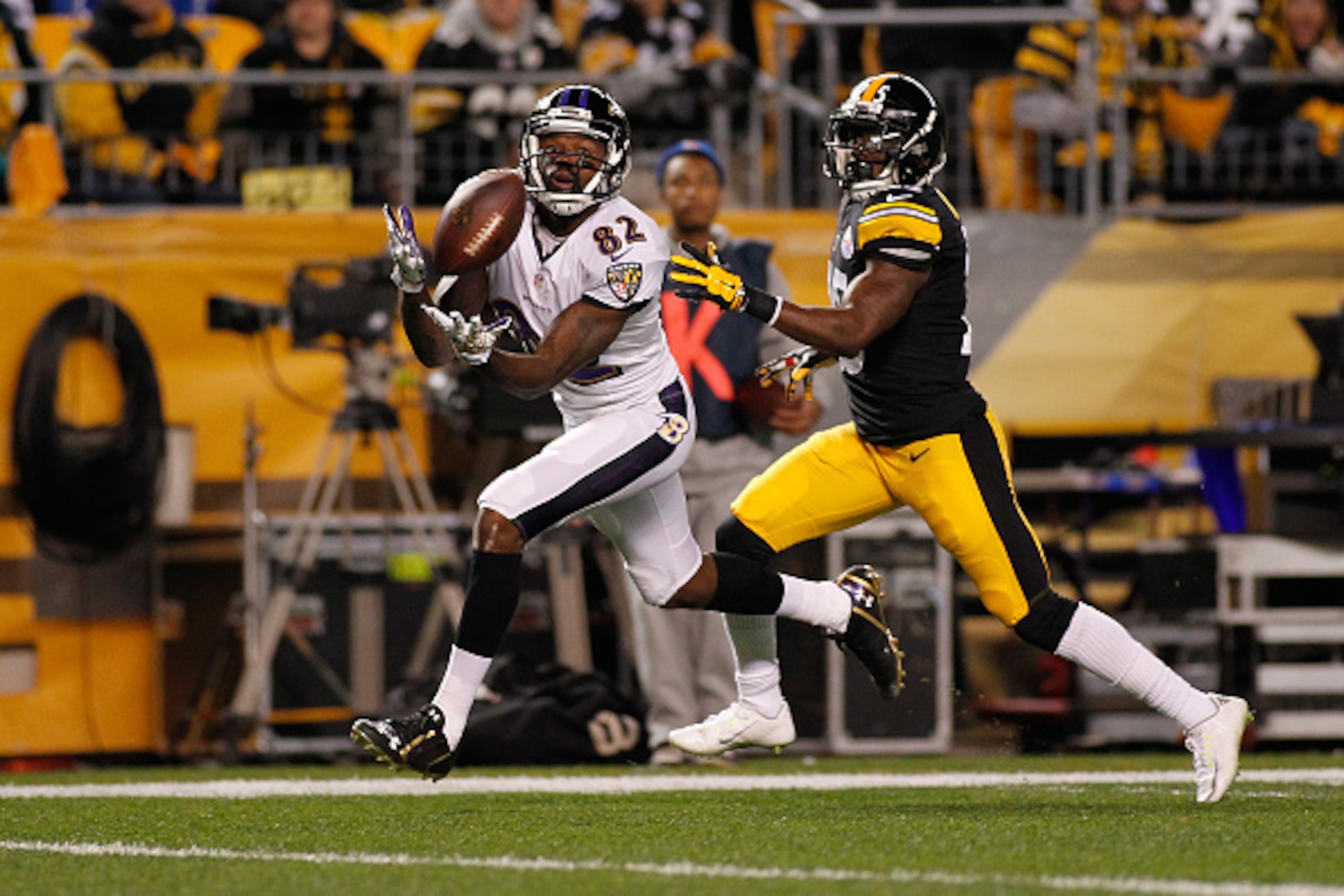 PITTSBURGH, PA - NOVEMBER 02:  Torrey Smith #82 of the Baltimore Ravens makes a touchdown catch in front of Brice McCain #25 of the Pittsburgh Steelers at Heinz Field on November 2, 2014 in Pittsburgh, Pennsylvania.  (Photo by Justin K. Aller/Getty Images