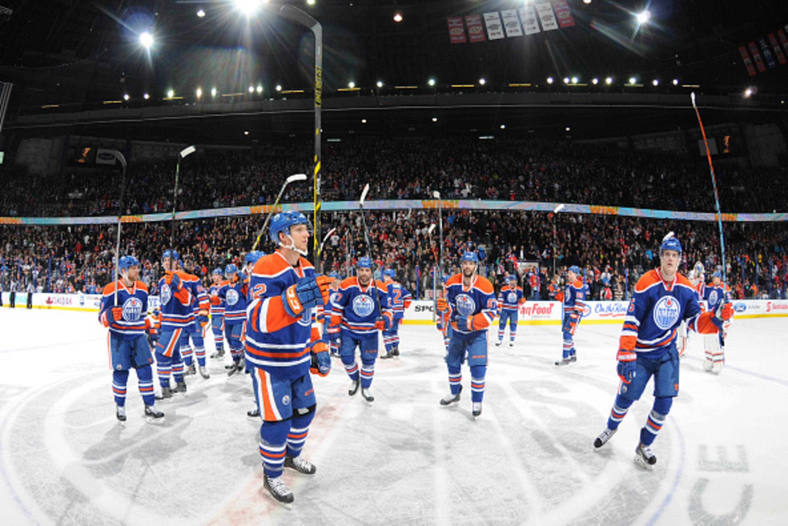 EDMONTON, AB - JANUARY 9: Players of the Edmonton Oilers salute the fans after winning the game against the Chicago Blackhawks on January 9, 2015 at Rexall Place in Edmonton, Alberta, Canada. (Photo by Andy Devlin/NHLI via Getty Images) EDMONTON, AB - JANUARY 9: Players of the Edmonton Oilers salute the fans after winning the game against the Chicago Blackhawks on January 9, 2015 at Rexall Place in Edmonton, Alberta, Canada. (Photo by Andy Devlin/NHLI via Getty Images)