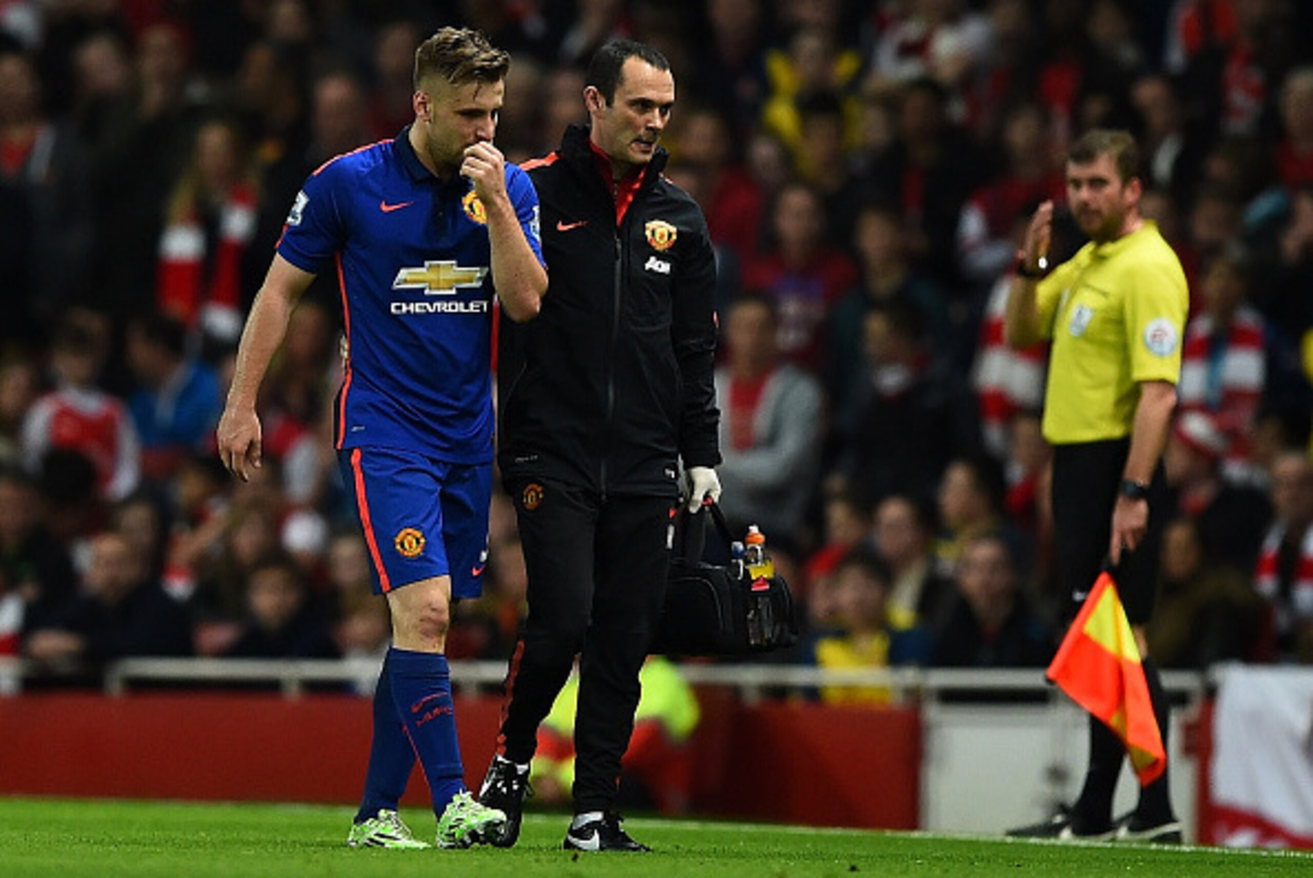 LONDON, ENGLAND - NOVEMBER 22:  Luke Shaw of Manchester United walks off injured during the Barclays Premier League match between Arsenal and Manchester United at Emirates Stadium on November 22, 2014 in London, England. (Photo by Shaun Botterill/Getty Im