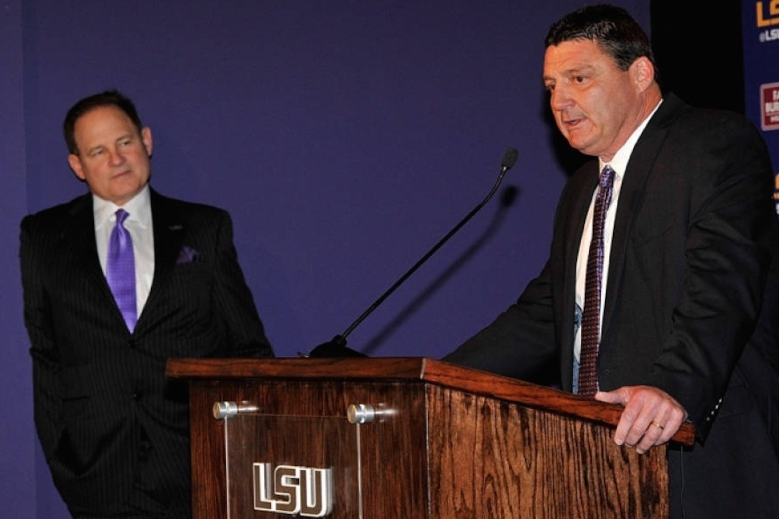 Miles, left, looks for a recruiting boost from Orgeron,