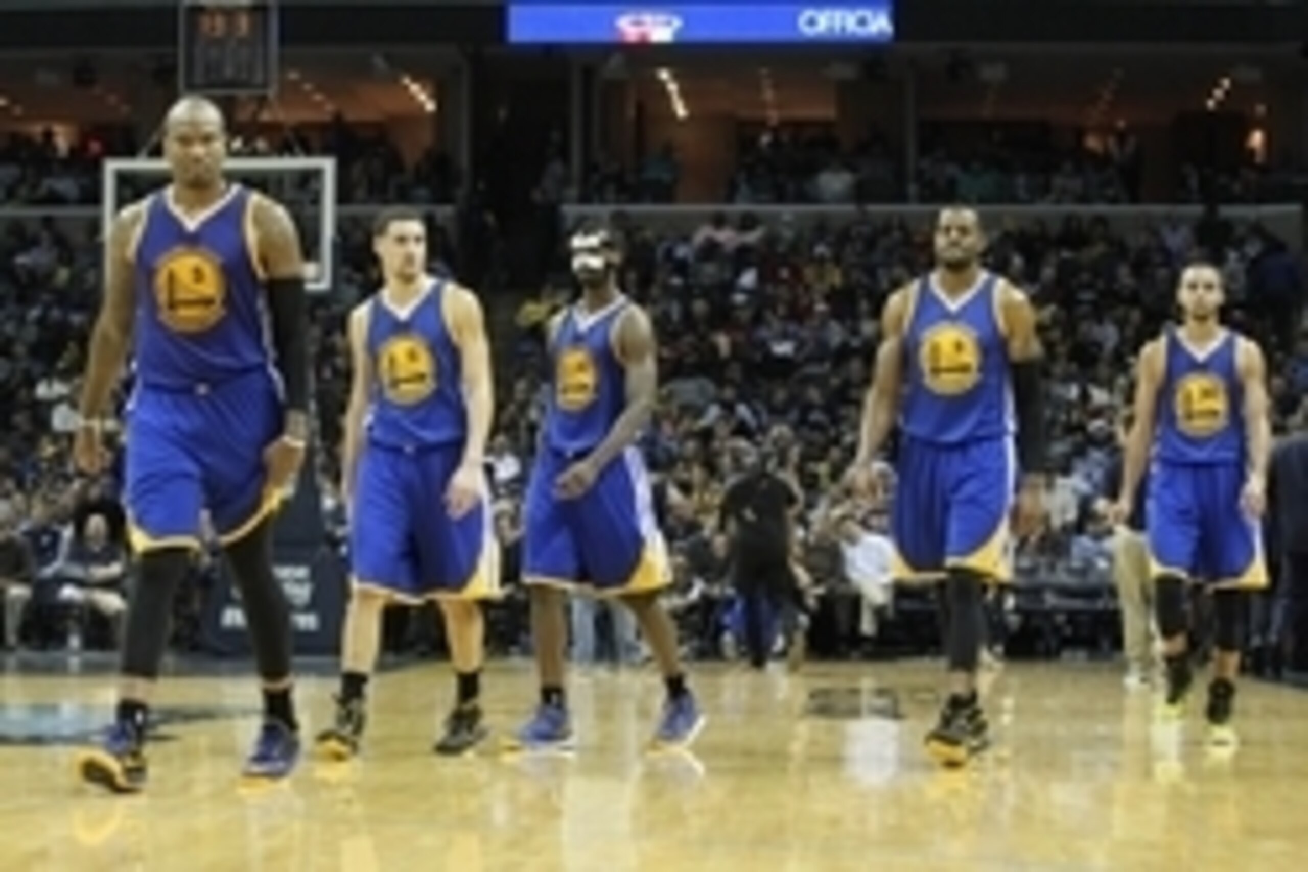 Dec 16, 2014; Memphis, TN, USA; Golden State Warriors forward Marries Speights (5) guard Klay Thompson (11) forward Harrison Barnes (40) and guards Andre Iguodala (9) and Stephen Curry (30) walk back on the court after a timeout in the first half against 