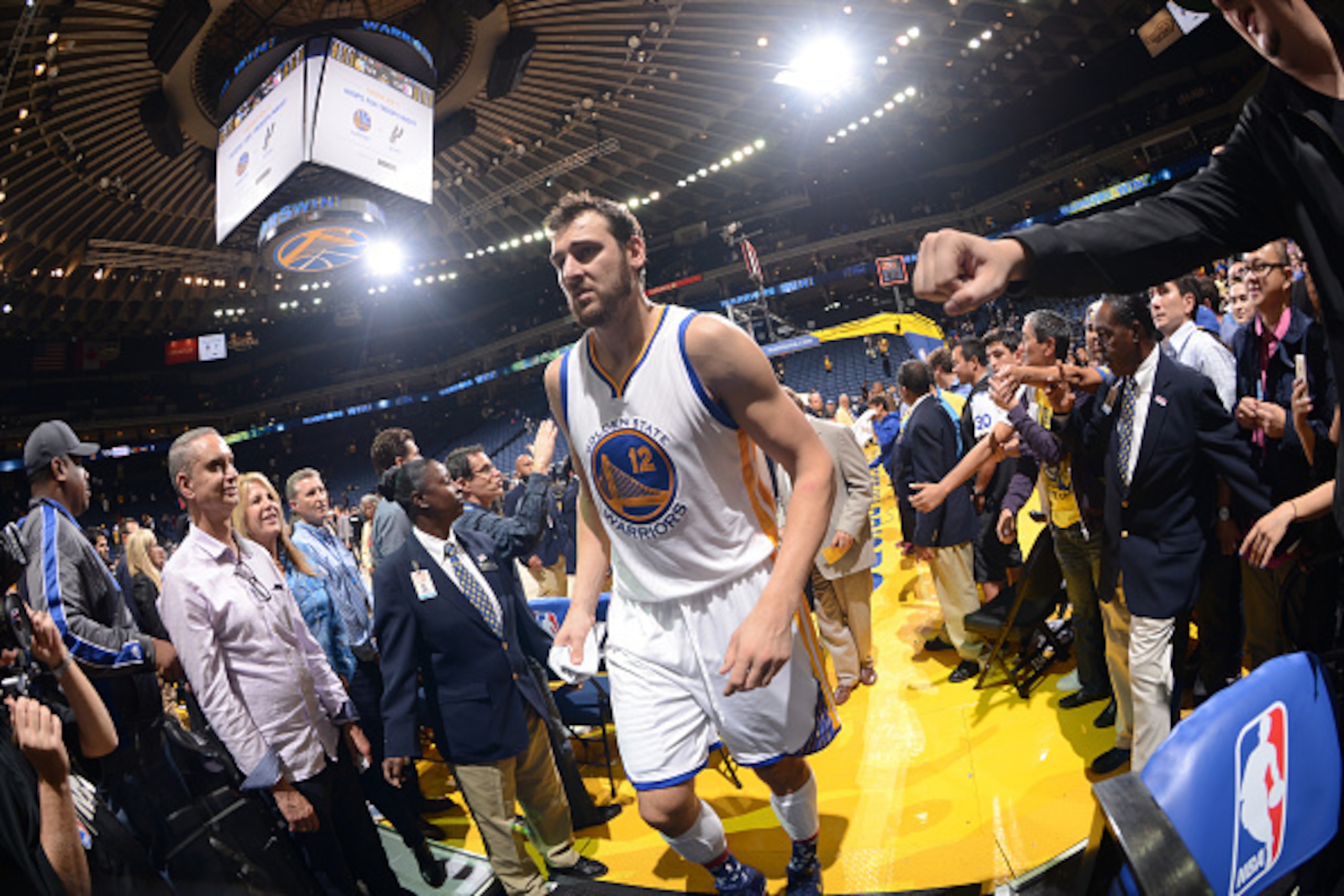 OAKLAND, CA - NOVEMBER 5: Andrew Bogut #12 of the Golden State Warriors walks to the locker room after a game against the Los Angeles Clippers on November 5, 2014 at Oracle Arena in Oakland, California. NOTE TO USER: User expressly acknowledges and agrees