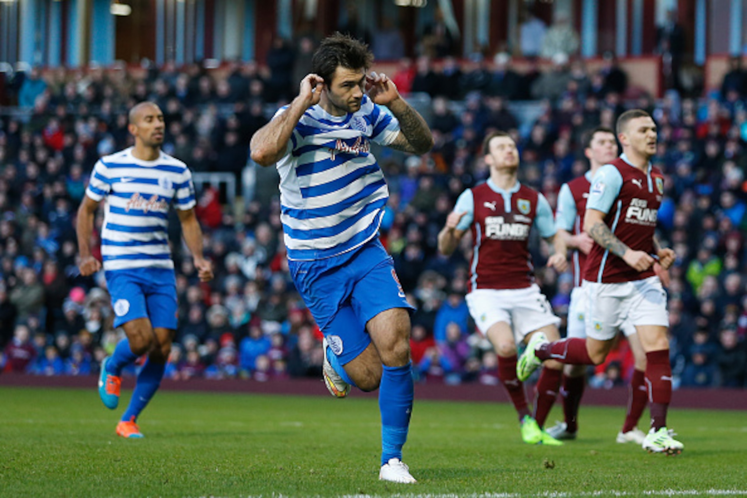 BURNLEY, ENGLAND - JANUARY 10:  Charlie Austin of QPR celebrates scoring his penalty during the Barclays Premier League match between Burnley and Queens Park Rangers at Turf Moor on January 10, 2015 in Burnley, England.  (Photo by Paul Thomas/Getty Images
