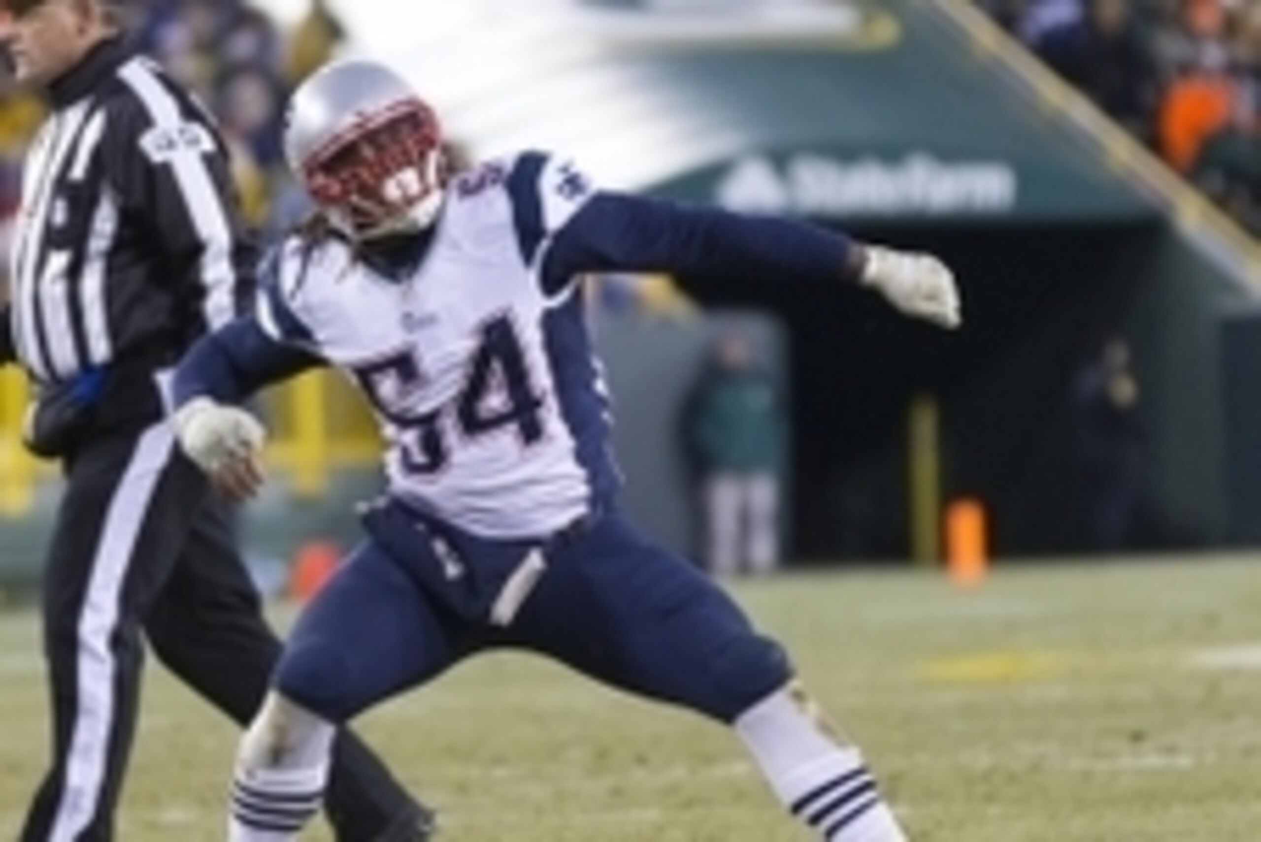 Nov 30, 2014; Green Bay, WI, USA; New England Patriots linebacker Dont'a Hightower (54) celebrates a sack during the second quarter against the Green Bay Packers at Lambeau Field. Mandatory Credit: Jeff Hanisch-USA TODAY Sports