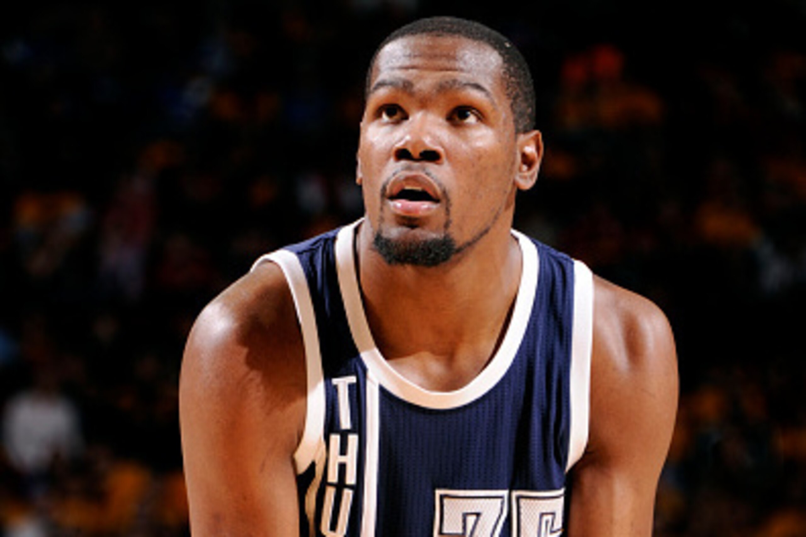 HOUSTON, TX - JANUARY 15: Kevin Durant #35 of the Oklahoma City Thunder attempts a free throw against the Houston Rockets on January 15, 2015 at the Toyota Center in Houston, Texas. NOTE TO USER: User expressly acknowledges and agrees that, by downloading