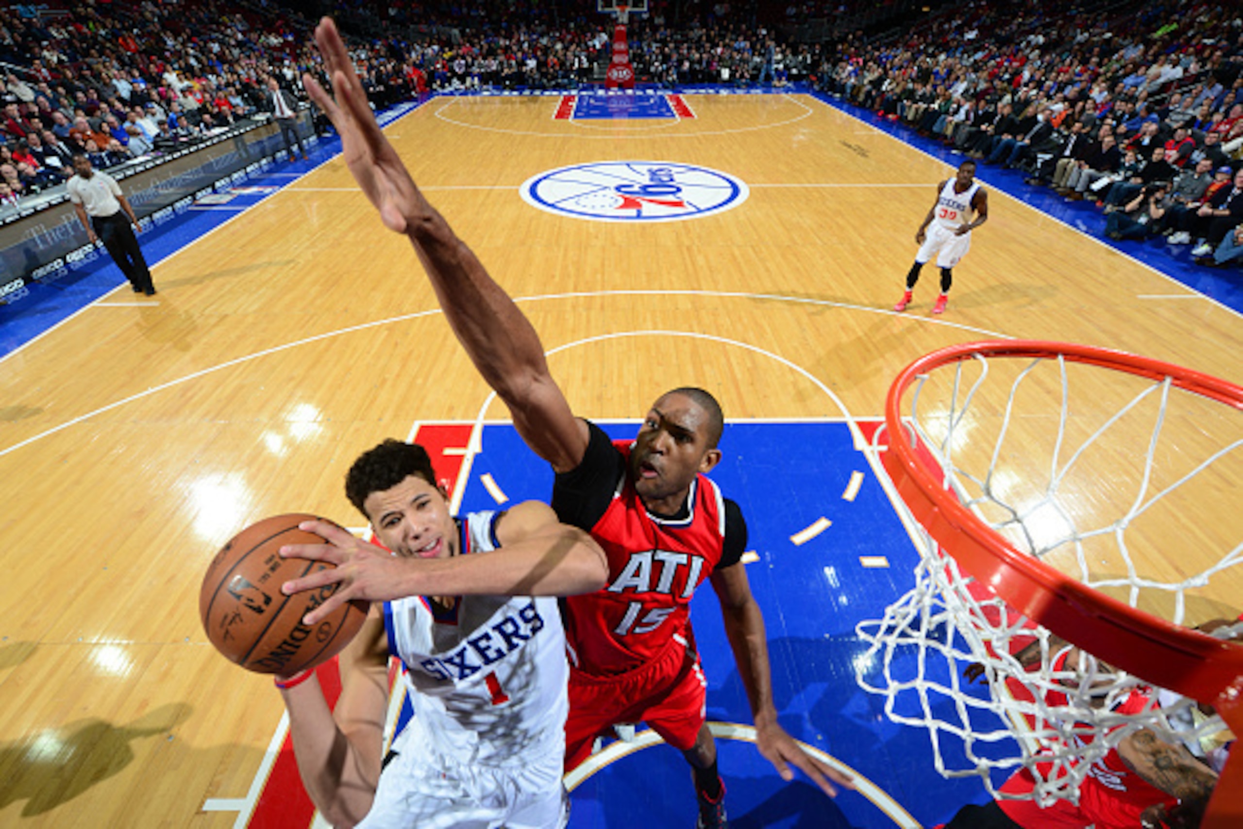 PHILADELPHIA, PA - JANUARY 13: Michael Carter-Williams #1 of the Philadelphia 76ers goes up for the layup in traffic against the Atlanta Hawks at Wells Fargo Center on January 13, 2015 in Philadelphia, Pennsylvania NOTE TO USER: User expressly acknowledge