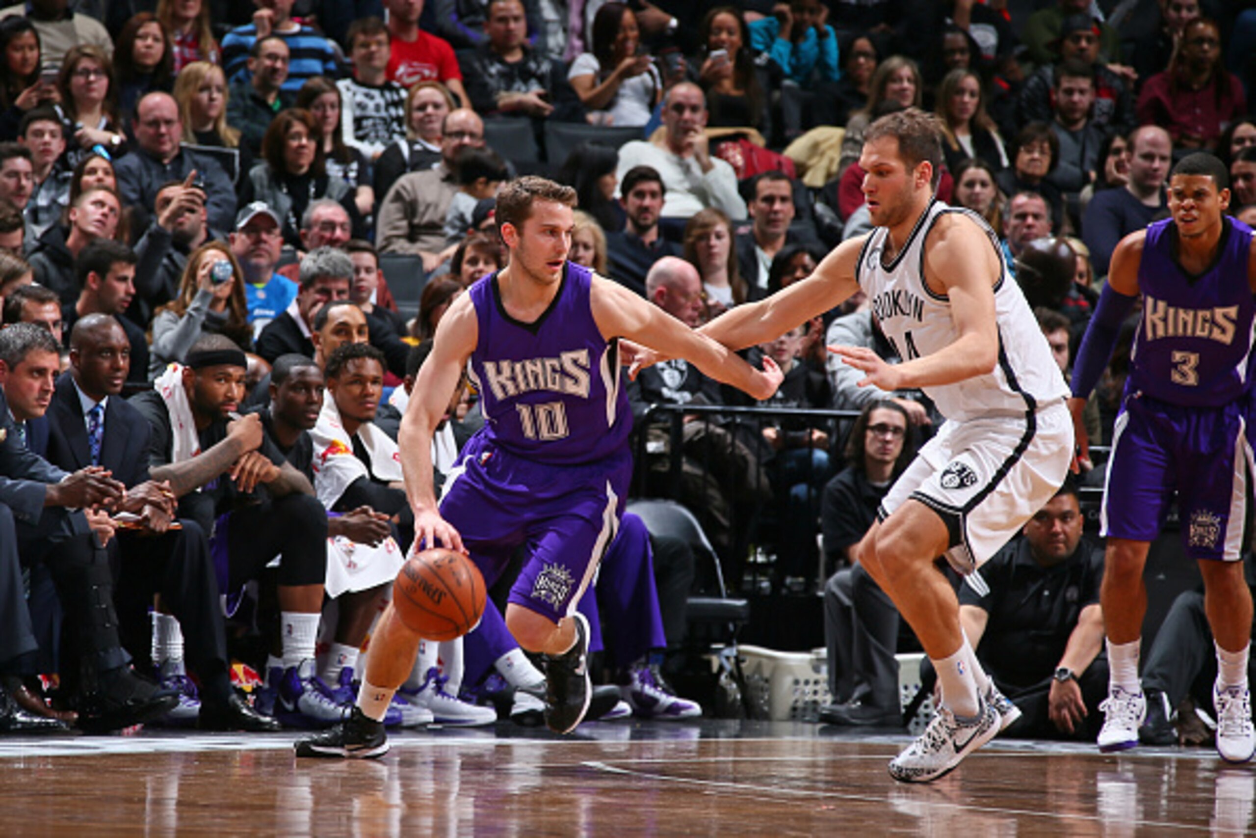 BROOKLYN, NY - DECEMBER 29:  Nik Stauskas #10 of the Sacramento Kings handles the ball against the Brooklyn Nets during the game on December 29, 2014 at Barclays Center in Brooklyn, New York. NOTE TO USER: User expressly acknowledges and agrees that, by d