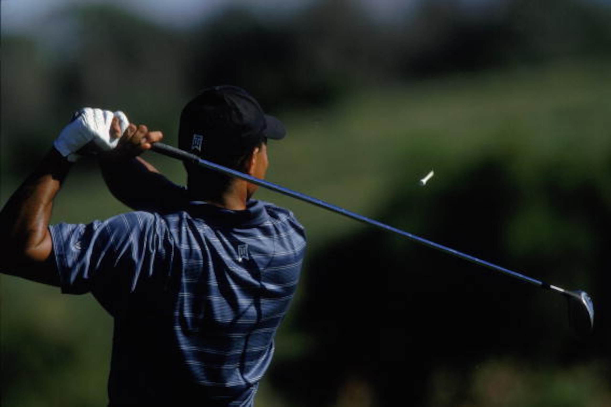 5 Jan 2002:  Tiger Woods hits the ball during the Mercedes Championship at the Plantation Course in Kapalua, Hawaii. Mandatory Credit:  Donald Miralle/Getty Images