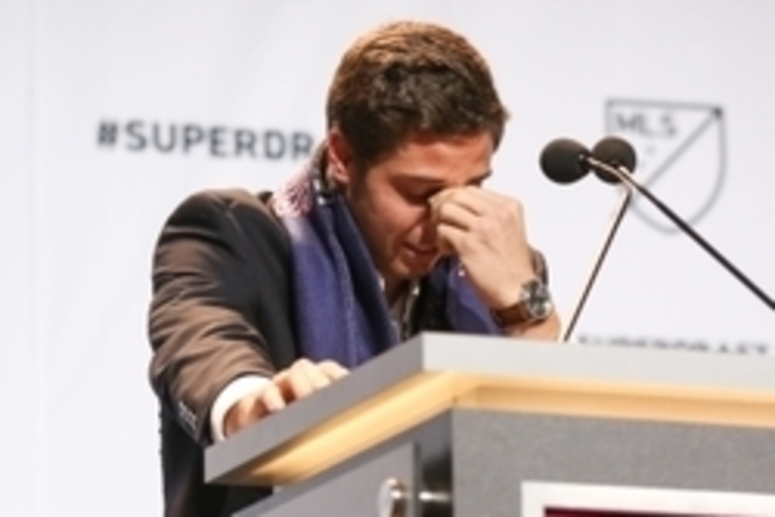 Jan 15, 2015; Philadelphia, PA, USA; Matt Polster takes a moment to gather himself after being selected as the number seven overall pick by the Chicago Fire in the 2015 MLS SuperDraft at Philadelphia Convention Center. Mandatory Credit: Bill Streicher-USA