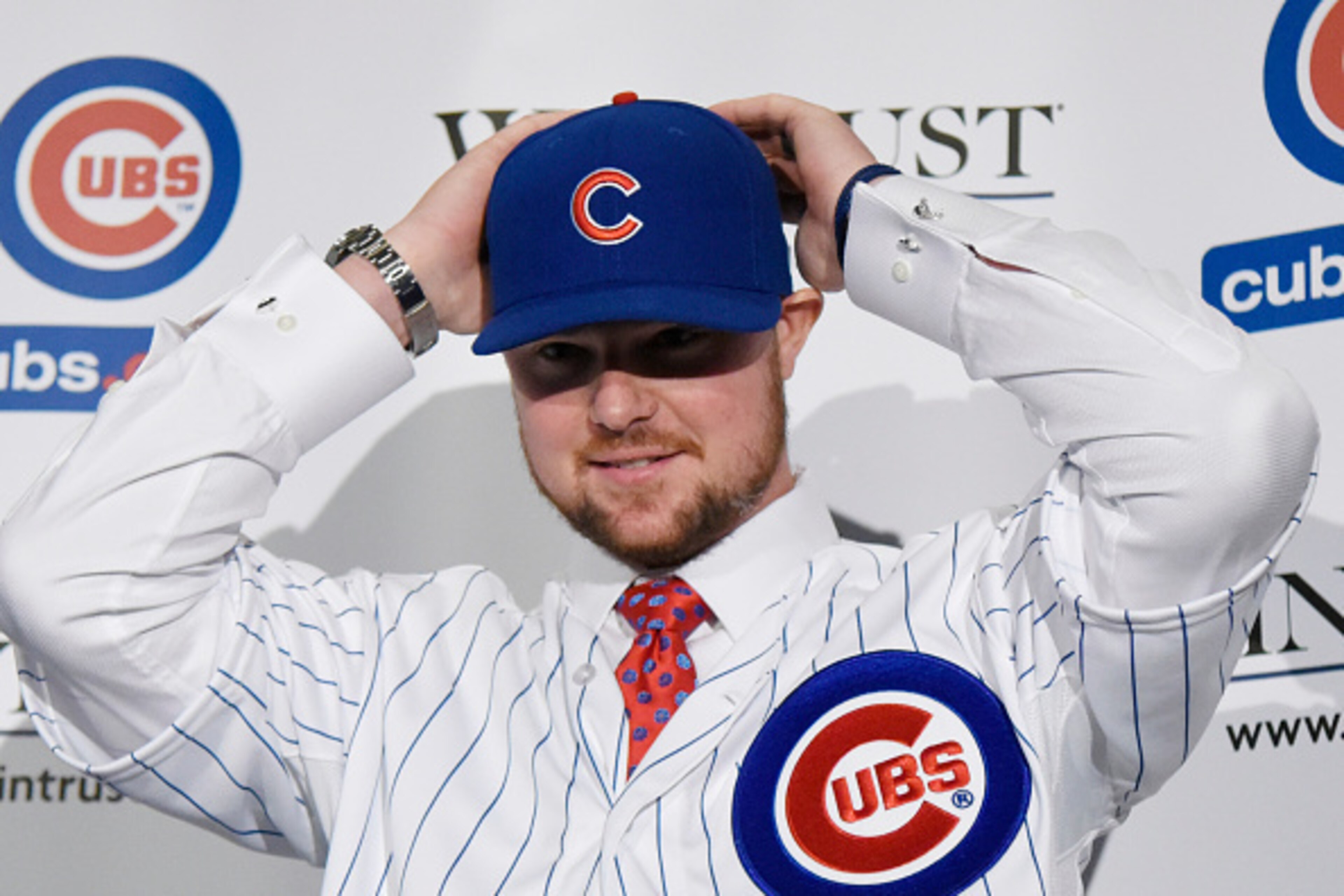 CHICAGO, IL - DECEMBER 15: Pitcher Jon Lester puts on a Cubs hat during an introduction press conference by the Chicago Cubs on December 15, 2014 in Chicago, Illinois. (Photo by David Banks/Getty Images) CHICAGO, IL - DECEMBER 15: Pitcher Jon Lester puts on a Cubs hat during an introduction press conference by the Chicago Cubs on December 15, 2014 in Chicago, Illinois. (Photo by David Banks/Getty Images)