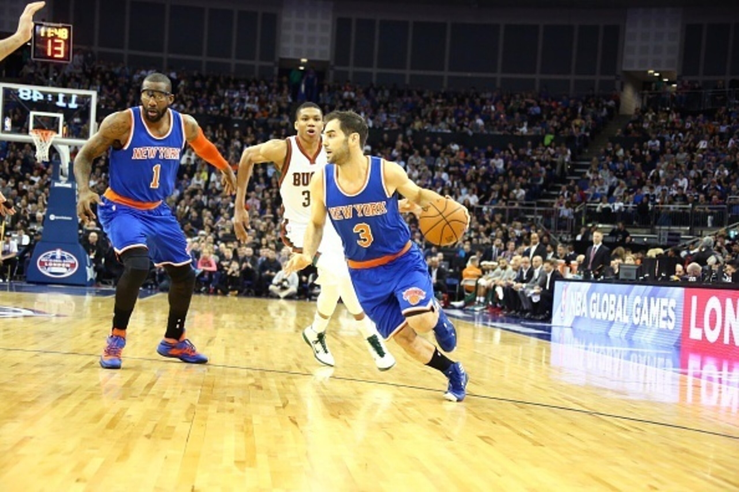 LONDON, ENGLAND - JANUARY 15: Jose Calderon #3 of the New York Knicks drives against Giannis Antetokounmpo #34 of the Milwaukee Bucks as part of the 2015 Global Games on January 15, 2015 at The O2 Arena in London, England. NOTE TO USER: User expressly ack