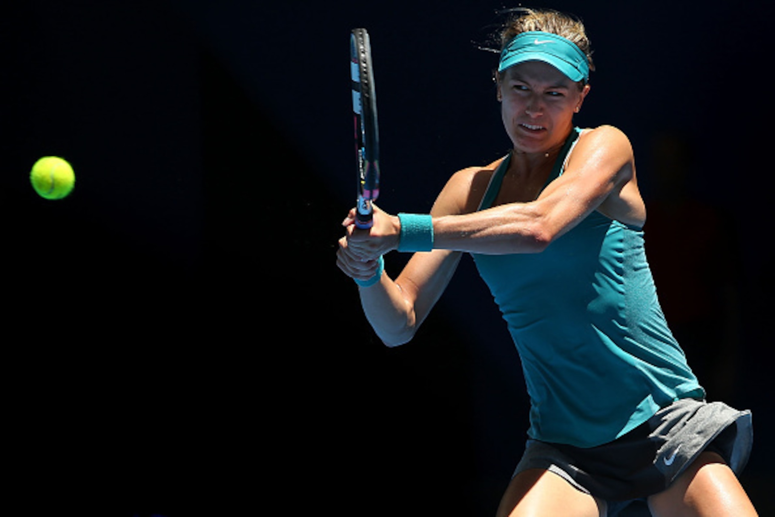 PERTH, AUSTRALIA - JANUARY 08: Eugenie Bouchard of Canada plays a backhand in her singles match against Flavia Pennetta of Italy during day five of the 2015 Hopman Cup at Perth Arena on January 8, 2015 in Perth, Australia.  (Photo by Paul Kane/Getty Image