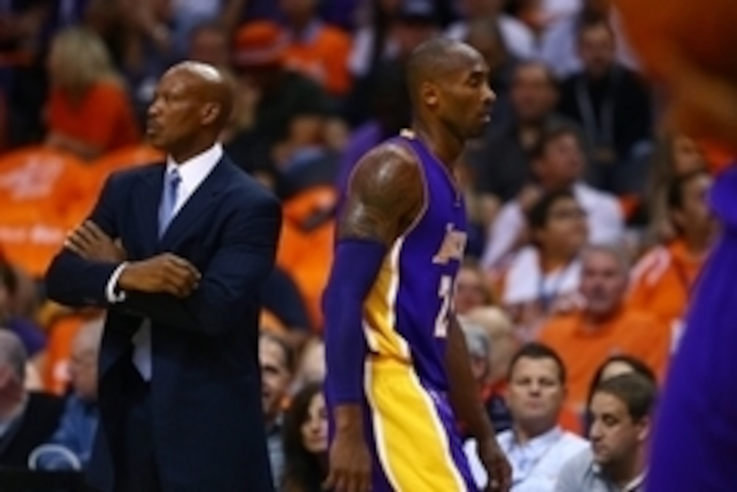 Oct 29, 2014; Phoenix, AZ, USA; Los Angeles Lakers head coach Byron Scott (left) with guard Kobe Bryant in the first half against the Phoenix Suns during the home opener at US Airways Center. The Suns defeated the Lakers 119-99. Mandatory Credit: Mark J. 