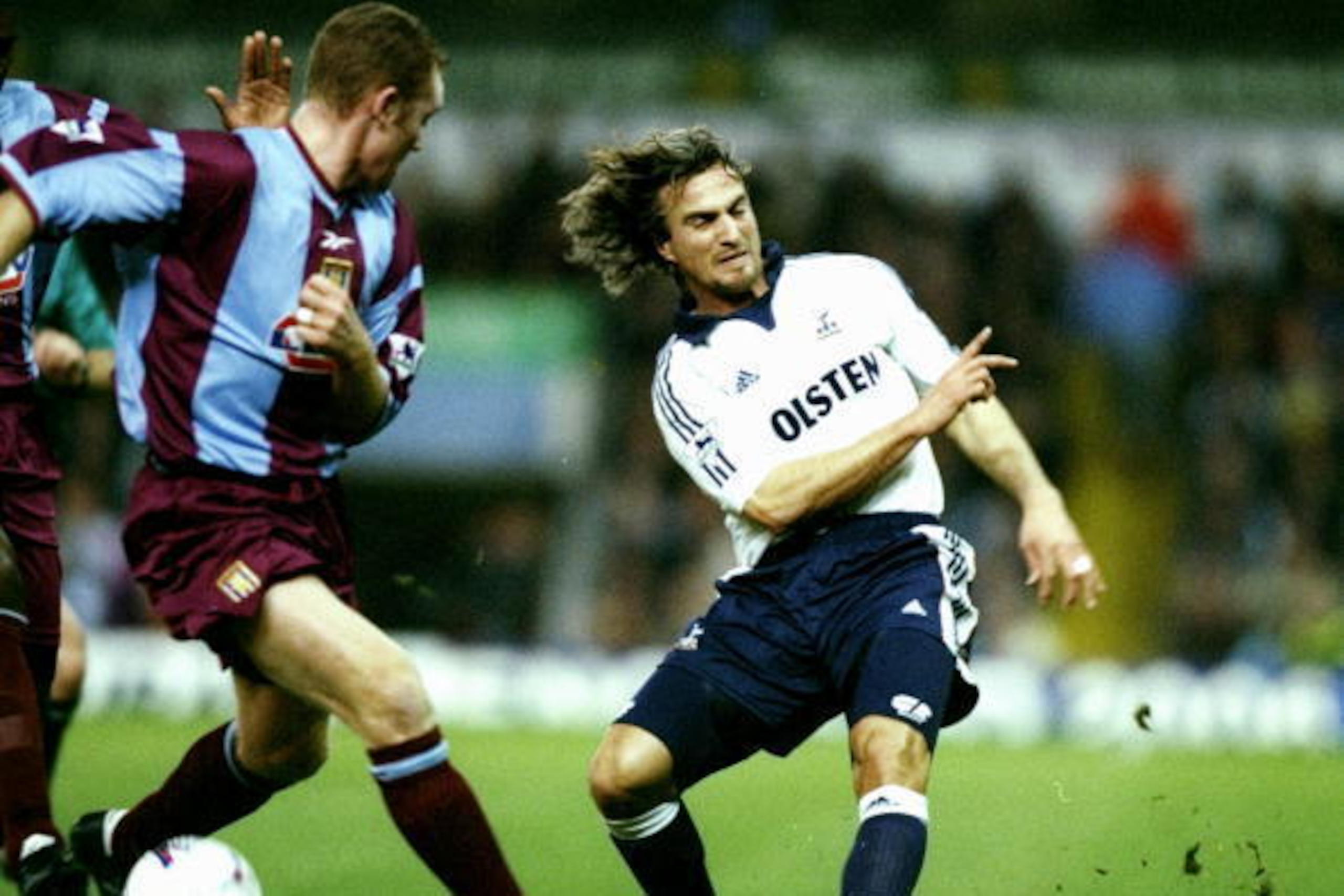 29 Dec 1999:  David Ginola of Tottenham Hotspur is faced by Steve Watson of Aston Villa during the FA Carling Premiership match at Villa Park in Birmingham, England. The game ended 1-1. \ Mandatory Credit: Ben Radford /Allsport