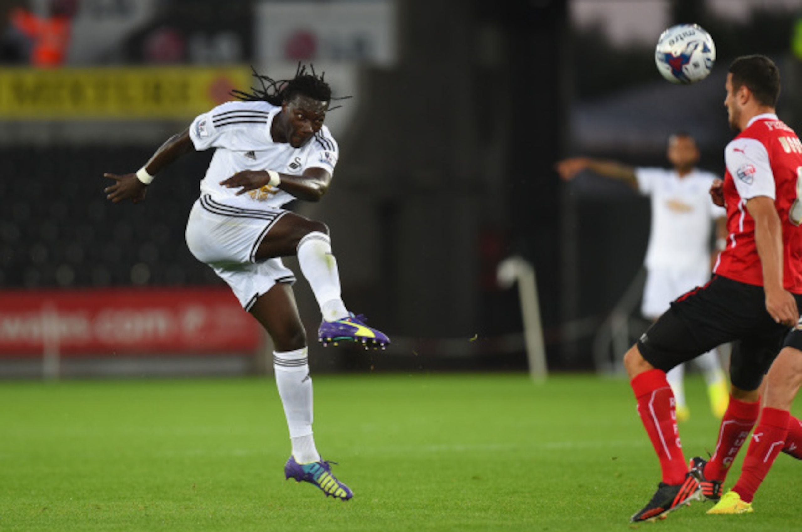 SWANSEA, WALES - AUGUST 26:  Swansea player Bafetimbi Gomis gets in a shot at goal during the Capital One Cup Second Round match between Swansea City and Rotherham United at Liberty Stadium on August 26, 2014 in Swansea, Wales.  (Photo by Stu Forster/Gett