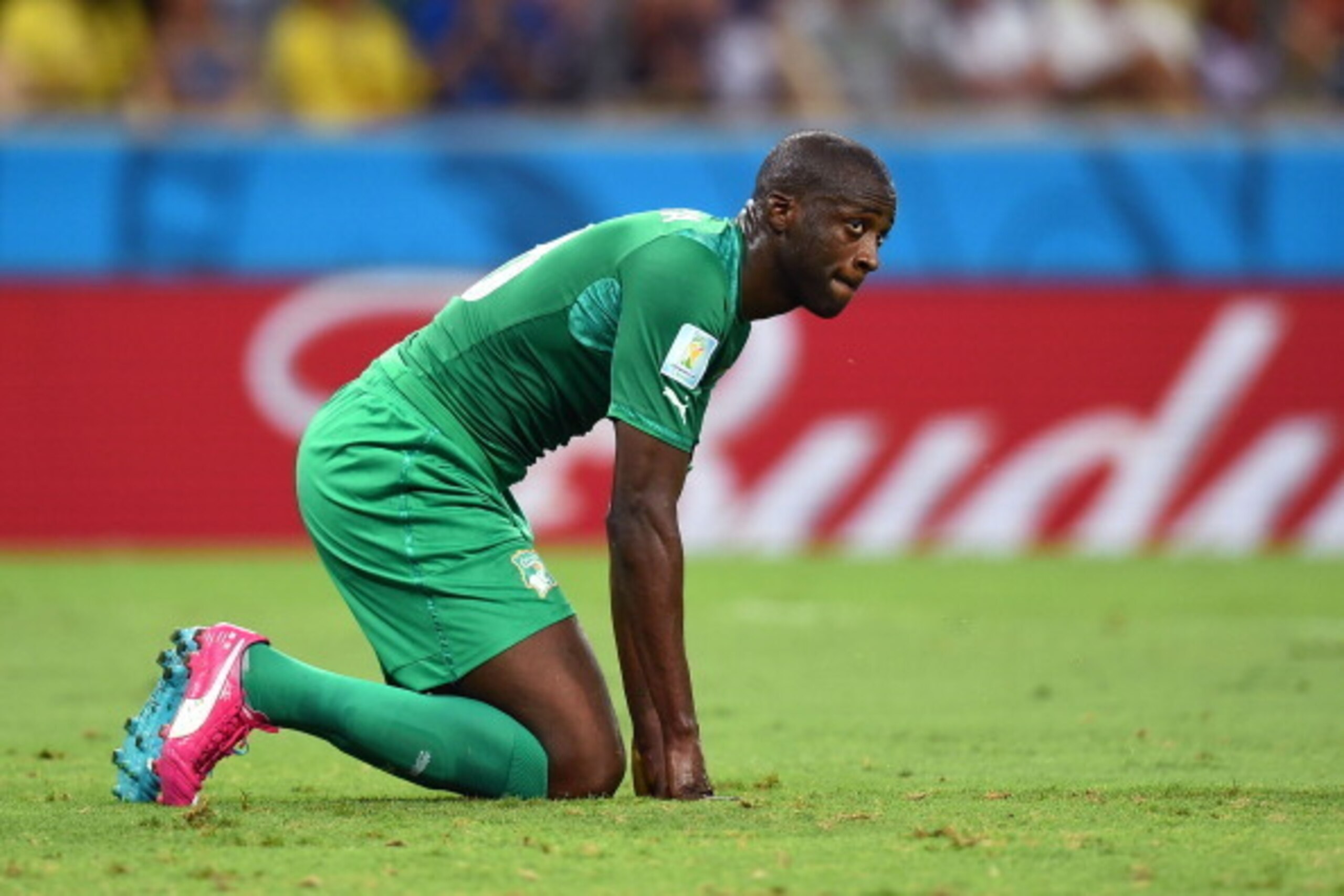 FORTALEZA, BRAZIL - JUNE 24: Yaya Toure of the Ivory Coast kneels after a missed chance during the 2014 FIFA World Cup Brazil Group C match between Greece and the Ivory Coast at Castelao on June 24, 2014 in Fortaleza, Brazil.  (Photo by Laurence Griffiths