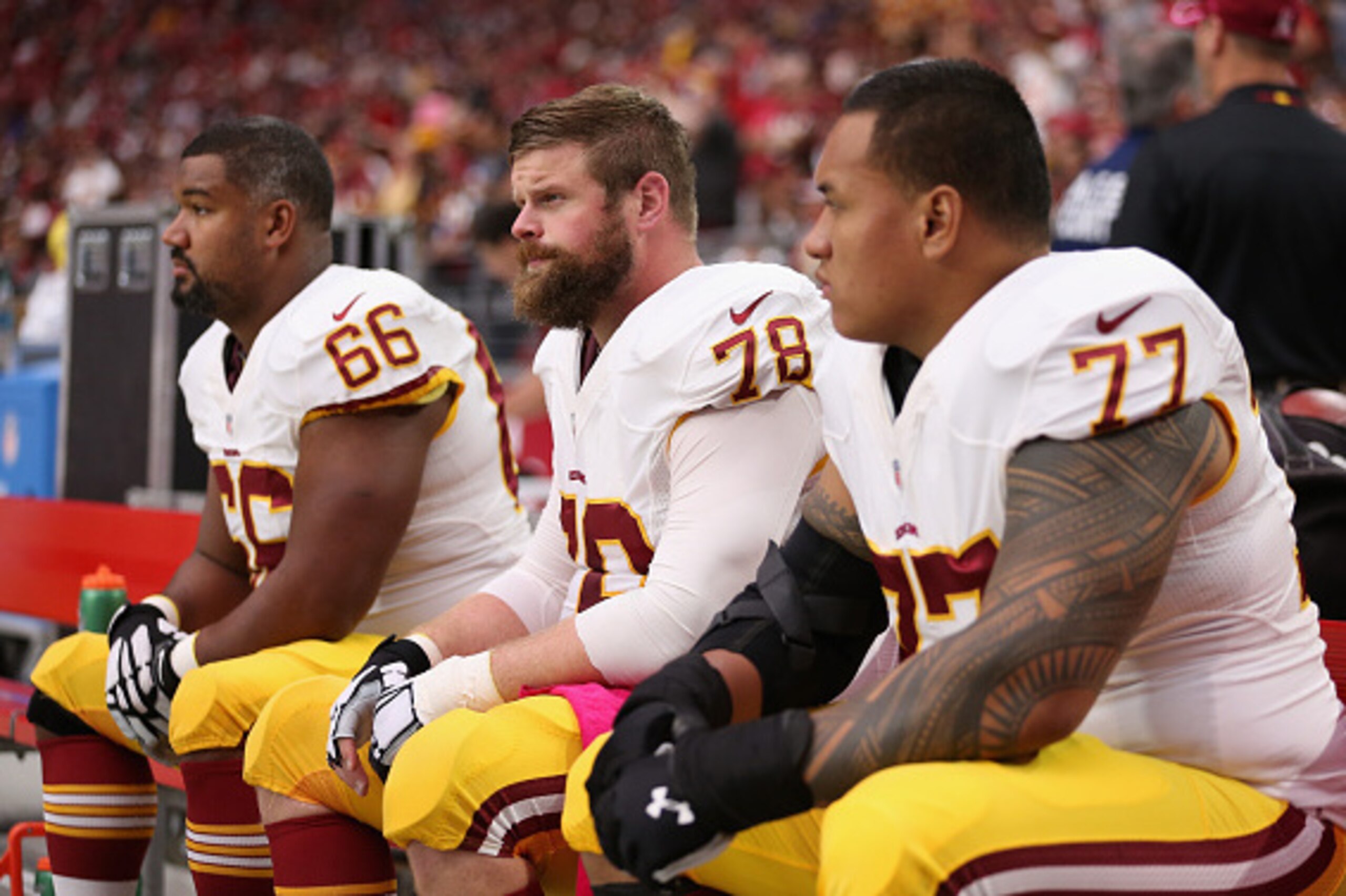 GLENDALE, AZ - OCTOBER 12:  (L-R) guard Chris Chester #66, center Kory Lichtensteiger #78 and guard Shawn Lauvao #77 of the Washington Redskins on the bench during the NFL game against the Arizona Cardinals at the University of Phoenix Stadium on October 