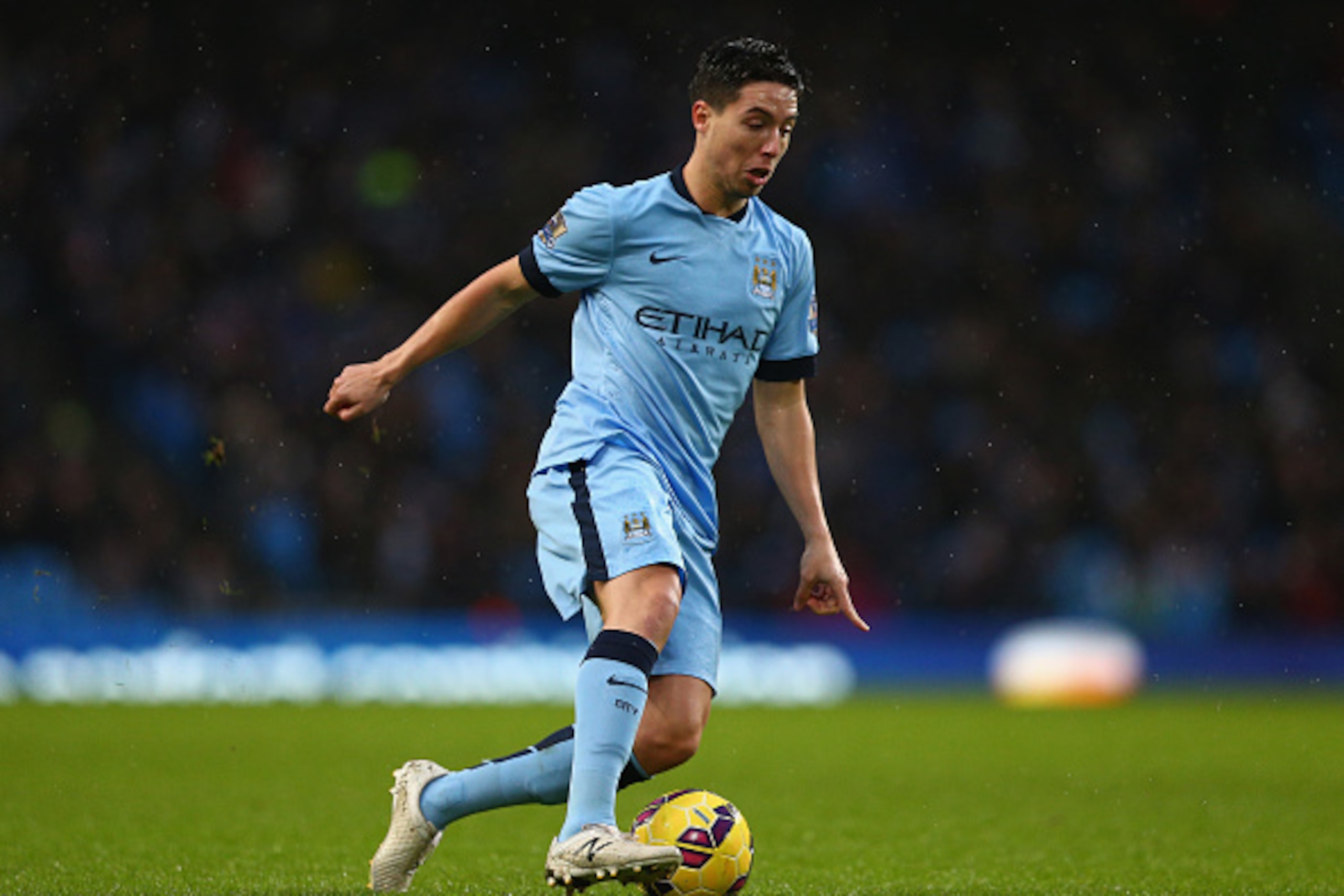 MANCHESTER, ENGLAND - JANUARY 01:  Samir Nasri of Manchester City in action during the Barclays Premier League match between Manchester City and Sunderland at Etihad Stadium on January 1, 2015 in Manchester, England.  (Photo by Clive Mason/Getty Images)