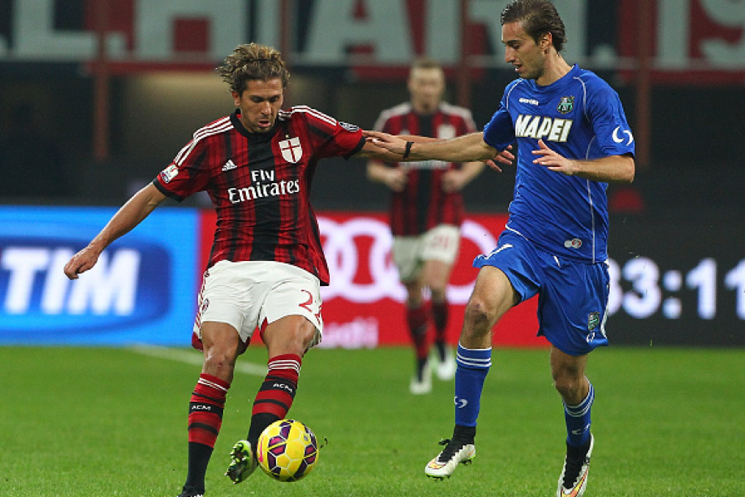 MILAN, ITALY - JANUARY 13: Alessio Cerci of AC Milan competes for the ball with Simone Missiroli of US Sassuolo Calcio during the TIM Cup match between AC Milan and US Sassuolo Calcio at Stadio Giuseppe Meazza on January 13, 2015 in Milan, Italy. (Photo MILAN, ITALY - JANUARY 13: Alessio Cerci of AC Milan competes for the ball with Simone Missiroli of US Sassuolo Calcio during the TIM Cup match between AC Milan and US Sassuolo Calcio at Stadio Giuseppe Meazza on January 13, 2015 in Milan, Italy. (Photo