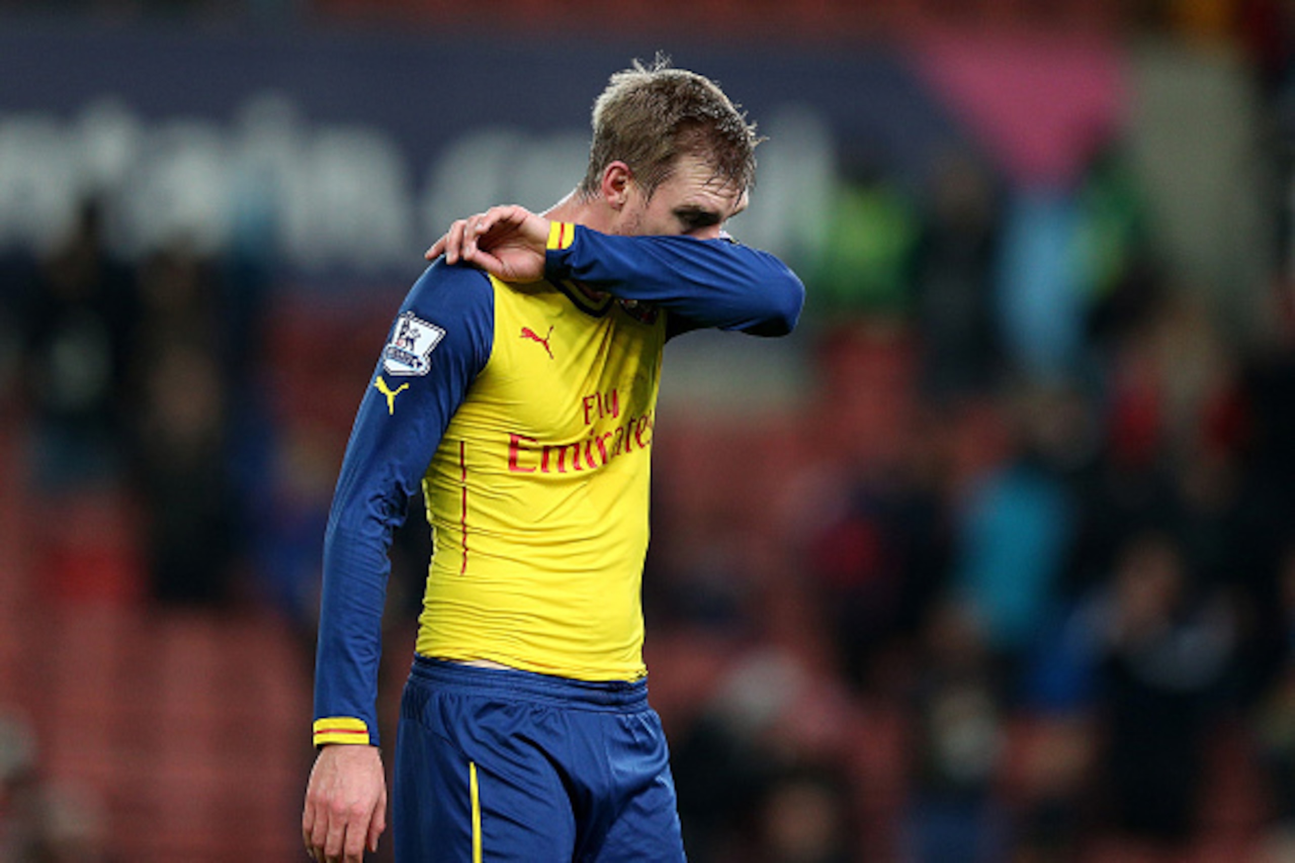 STOKE ON TRENT, ENGLAND - DECEMBER 06:  Per Mertesacker of Arsenal looks dejected at the end of the Barclays Premier League match between Stoke City and Arsenal  at the Britannia Stadium on December 6, 2014 in Stoke on Trent, England.  (Photo by Clive Mas