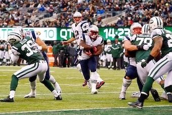 EAST RUTHERFORD, NJ - DECEMBER 21: Running back Jonas Gray #35 of the New England Patriots carries the ball against the New York Jets during a game at MetLife Stadium on December 21, 2014 in East Rutherford, New Jersey.  (Photo by Al Bello/Getty Images)