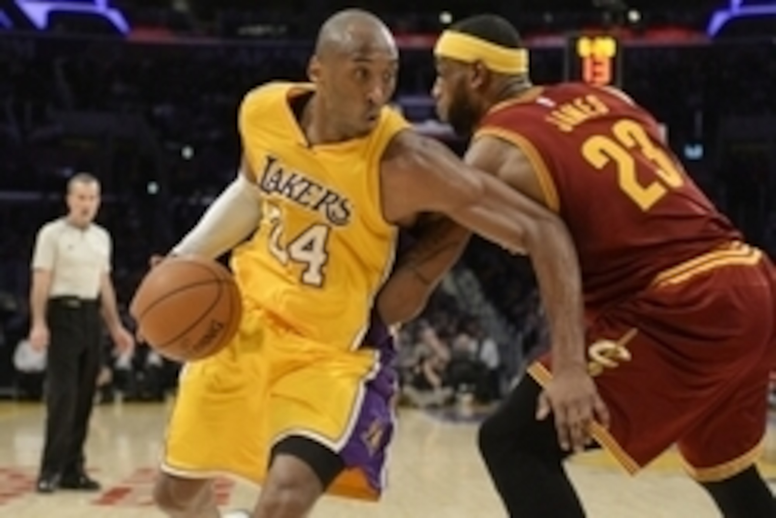 Jan 15, 2015; Los Angeles, CA, USA; Los Angeles Lakers guard Kobe Bryant (24) drives to the basket against Cleveland Cavaliers forward LeBron James (23) in the second half of the NBA game at Staples Center. Mandatory Credit: Richard Mackson-USA TODAY Spor