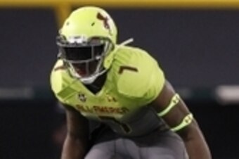 Jan 2, 2014; St. Petersburg, FL, USA; Team Nitro safety Laurence Jones (7) defends during the second half at Tropicana Field. Team Highlight defeated the Team Nitro 31-21. Mandatory Credit: Kim Klement-USA TODAY Sports
