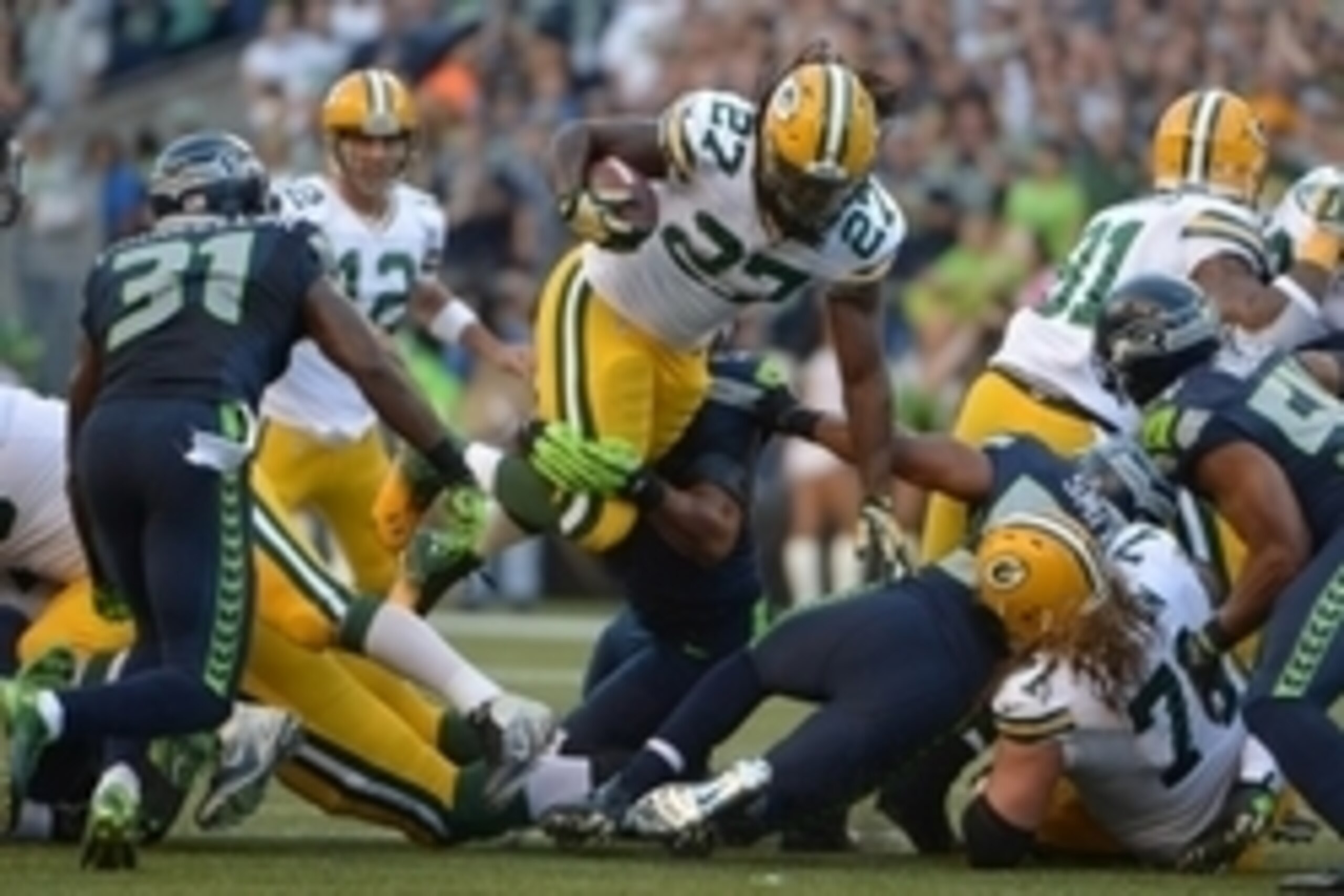 Sep 4, 2014; Seattle, WA, USA; Green Bay Packers running back Eddie Lacy (27) carries the ball against the Seattle Seahawks at CenturyLink Field. The Seahawks defeated the Packers 36-16. Mandatory Credit: Kirby Lee-USA TODAY Sports