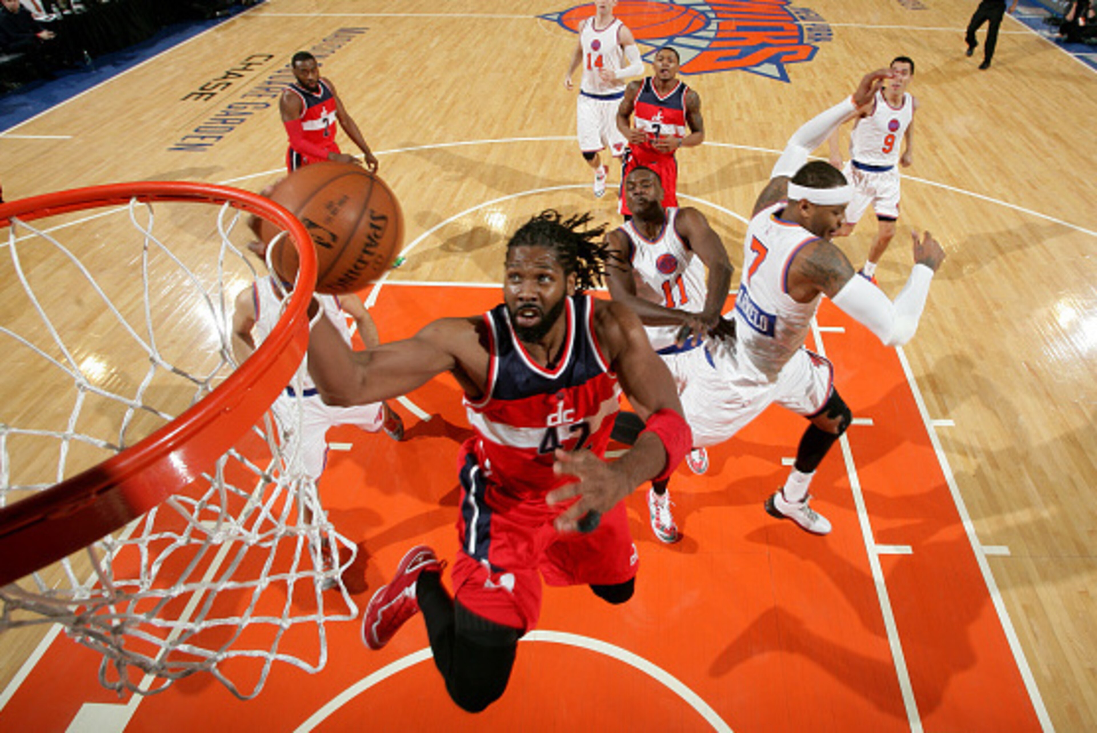 NEW YORK, NY - DECEMBER 25: Nene Hilario #42 of the Washington Wizards shoots during a game against the New York Knicks at Madison Square Garden on December 25, 2014 in New York, New York. NOTE TO USER: User expressly acknowledges and agrees that, by down