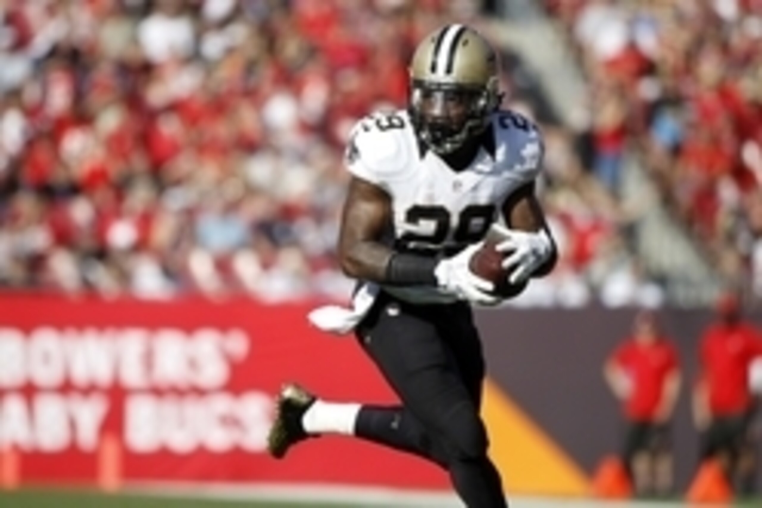 Dec 28, 2014; Tampa, FL, USA; New Orleans Saints running back Mark Ingram (22) runs with the ball against the Tampa Bay Buccaneers during the second half at Raymond James Stadium. New Orleans Saints defeated the Tampa Bay Buccaneers 23-20. Mandatory Credi
