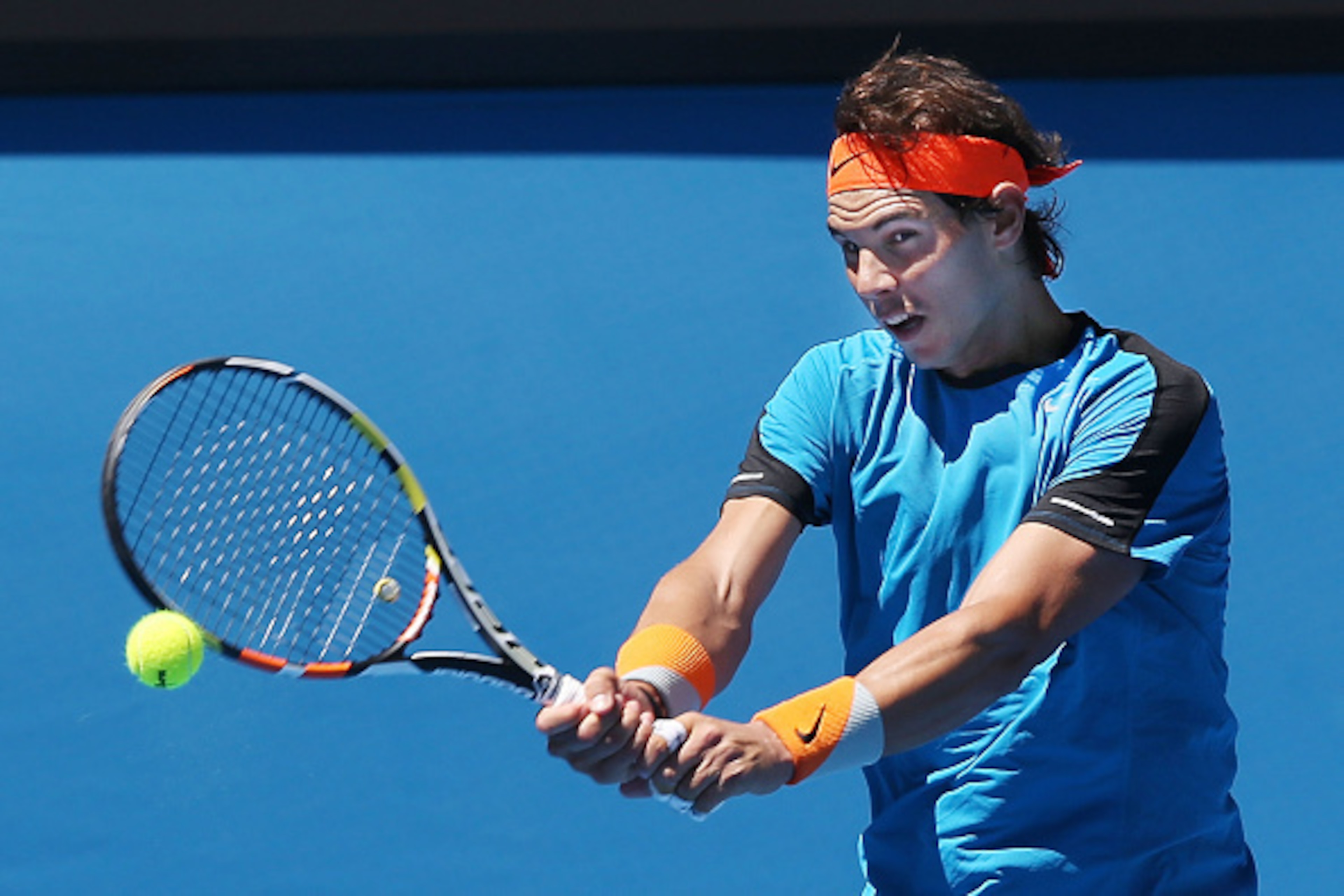MELBOURNE, AUSTRALIA - JANUARY 16:  Rafael Nadal of Spain hits a backhand during a practice session ahead of the 2015 Australian Open at Melbourne Park on January 16, 2015 in Melbourne, Australia.  (Photo by Michael Dodge/Getty Images)
