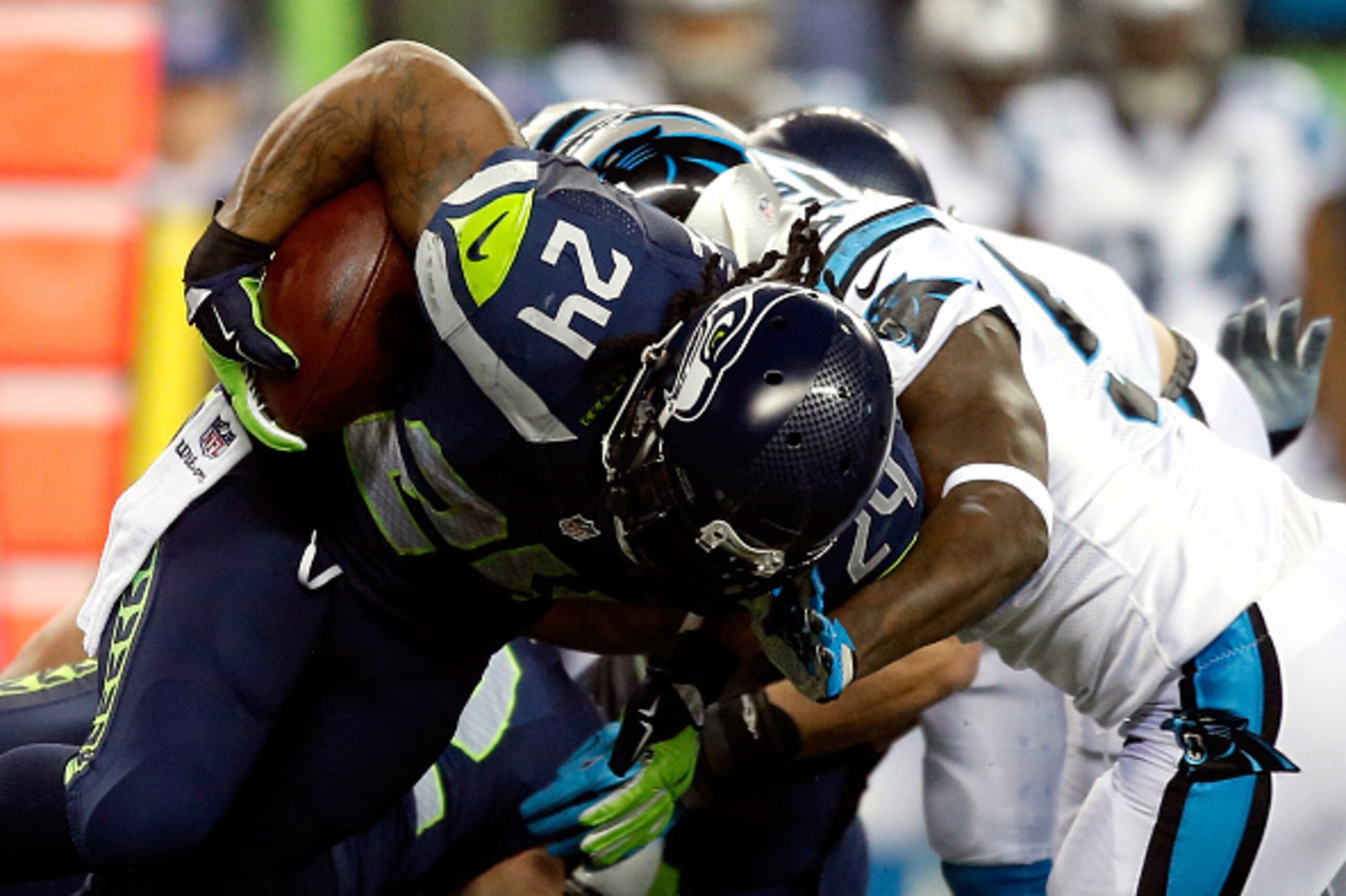SEATTLE, WA - JANUARY 10:   Marshawn Lynch #24 of the Seattle Seahawks in action against the Carolina Panthers during the 2015 NFC Divisional Playoff game at CenturyLink Field on January 10, 2015 in Seattle, Washington.  (Photo by Otto Greule Jr/Getty Ima