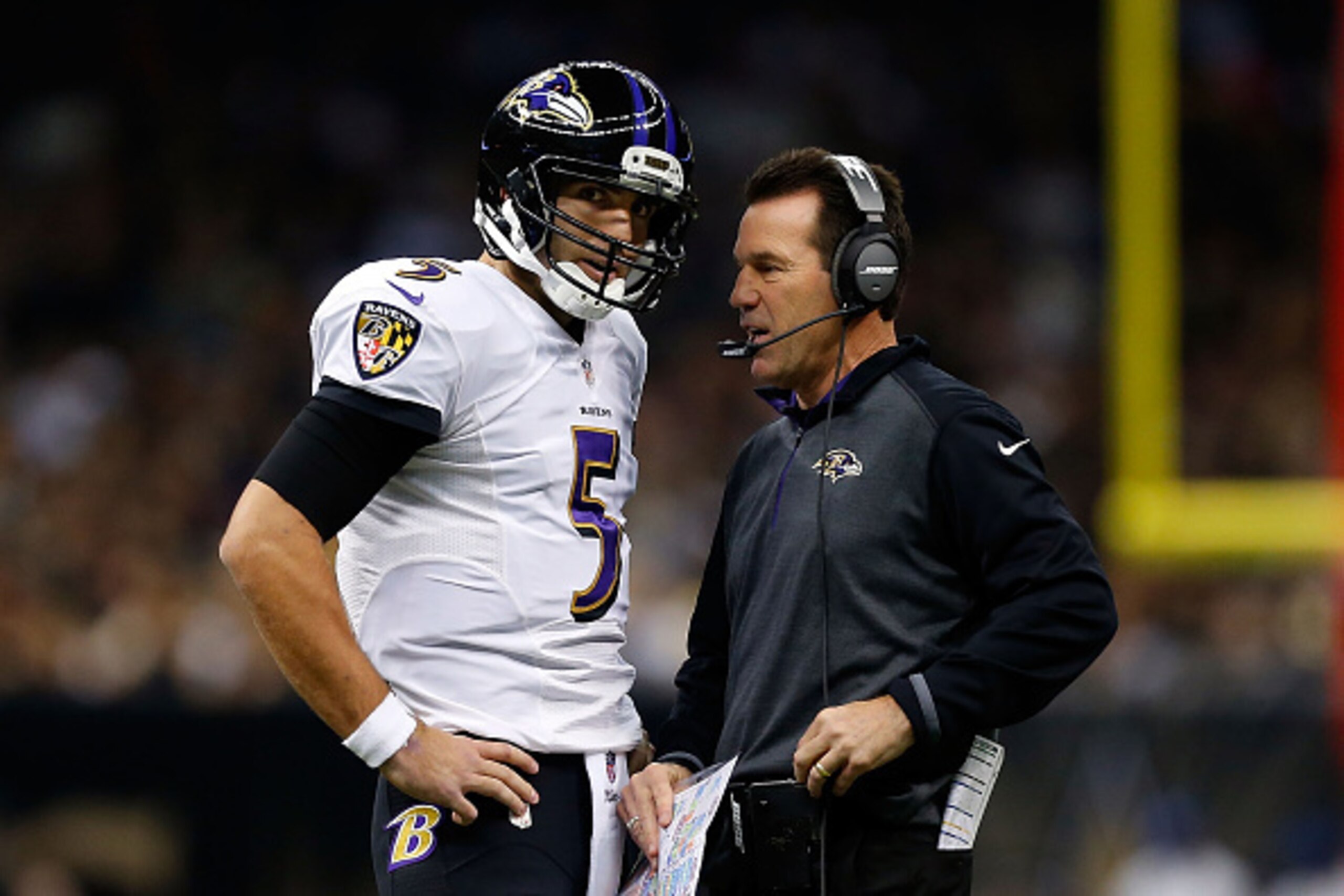 NEW ORLEANS, LA - NOVEMBER 24:  Joe Flacco #5 of the Baltimore Ravens speaks with offensive coordinator Gary Kubiak during the first quarter of a game against the New Orleans Saints at the Mercedes-Benz Superdome on November 24, 2014 in New Orleans, Louis