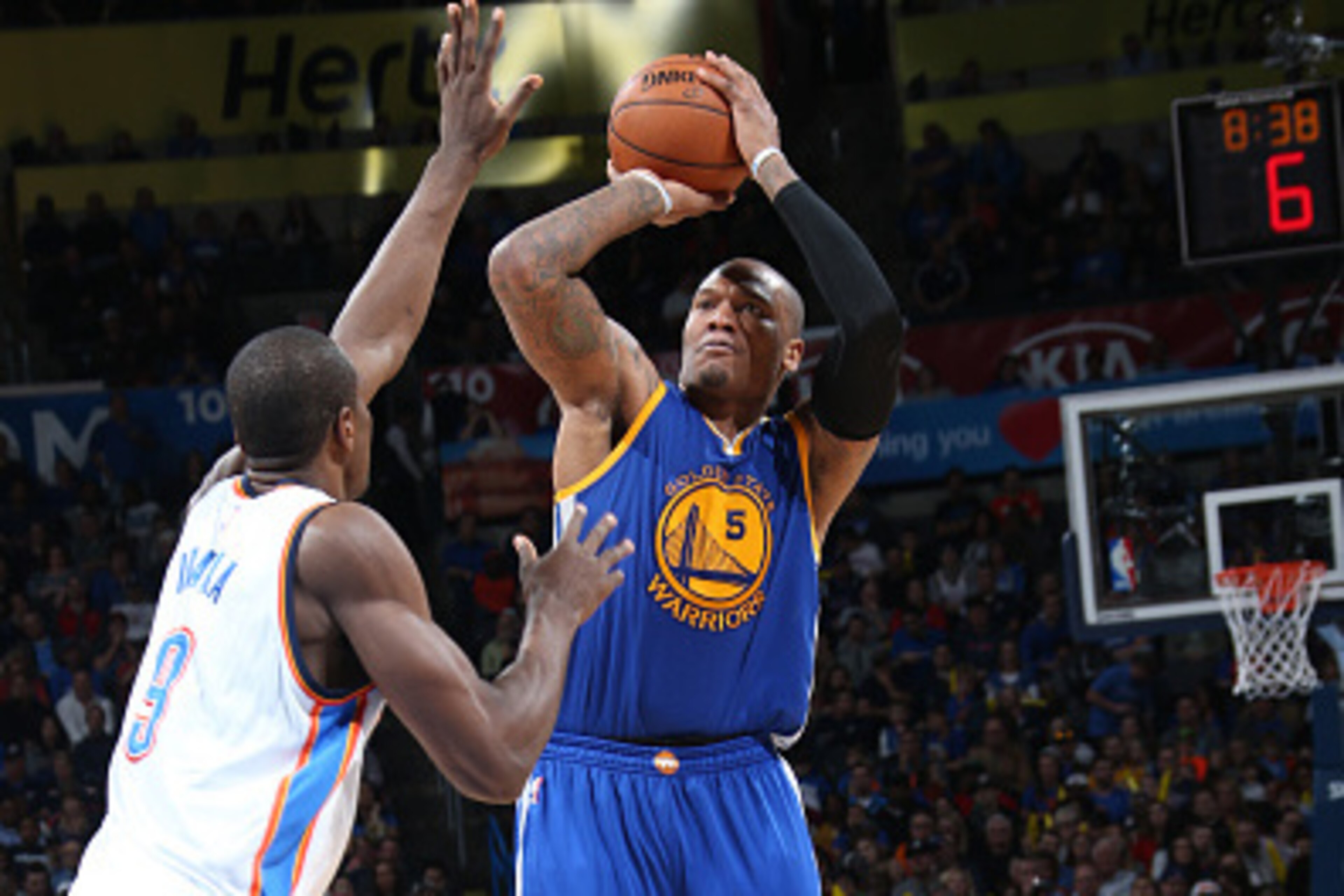 OKLAHOMA CITY, OK- JANUARY 16: Marreese Speights #5 of the Golden State Warriors shoots against the Oklahoma City Thunder on January 16, 2015 at Chesapeake Energy Arena in Oklahoma City, OK. NOTE TO USER: User expressly acknowledges and agrees that, by do