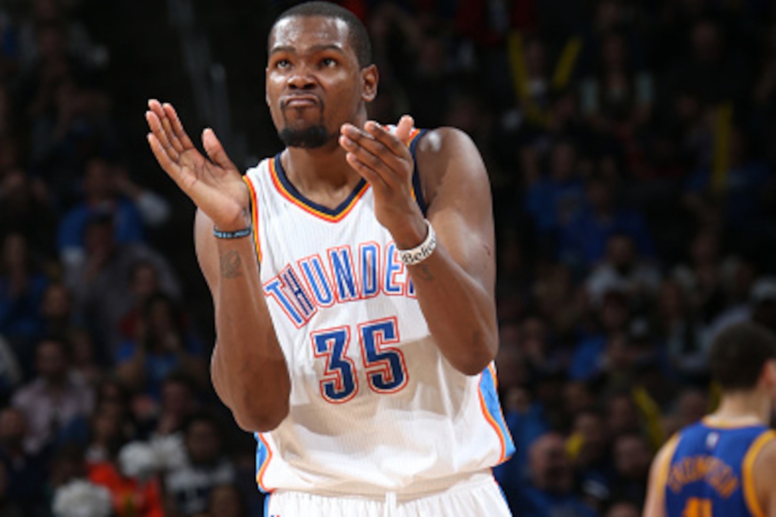 OKLAHOMA CITY, OK- JANUARY 16: Kevin Durant #35 of the Oklahoma City Thunder celebrates during a game against the Golden State Warriors on January 16, 2015 at Chesapeake Energy Arena in Oklahoma City, OK. NOTE TO USER: User expressly acknowledges and agre
