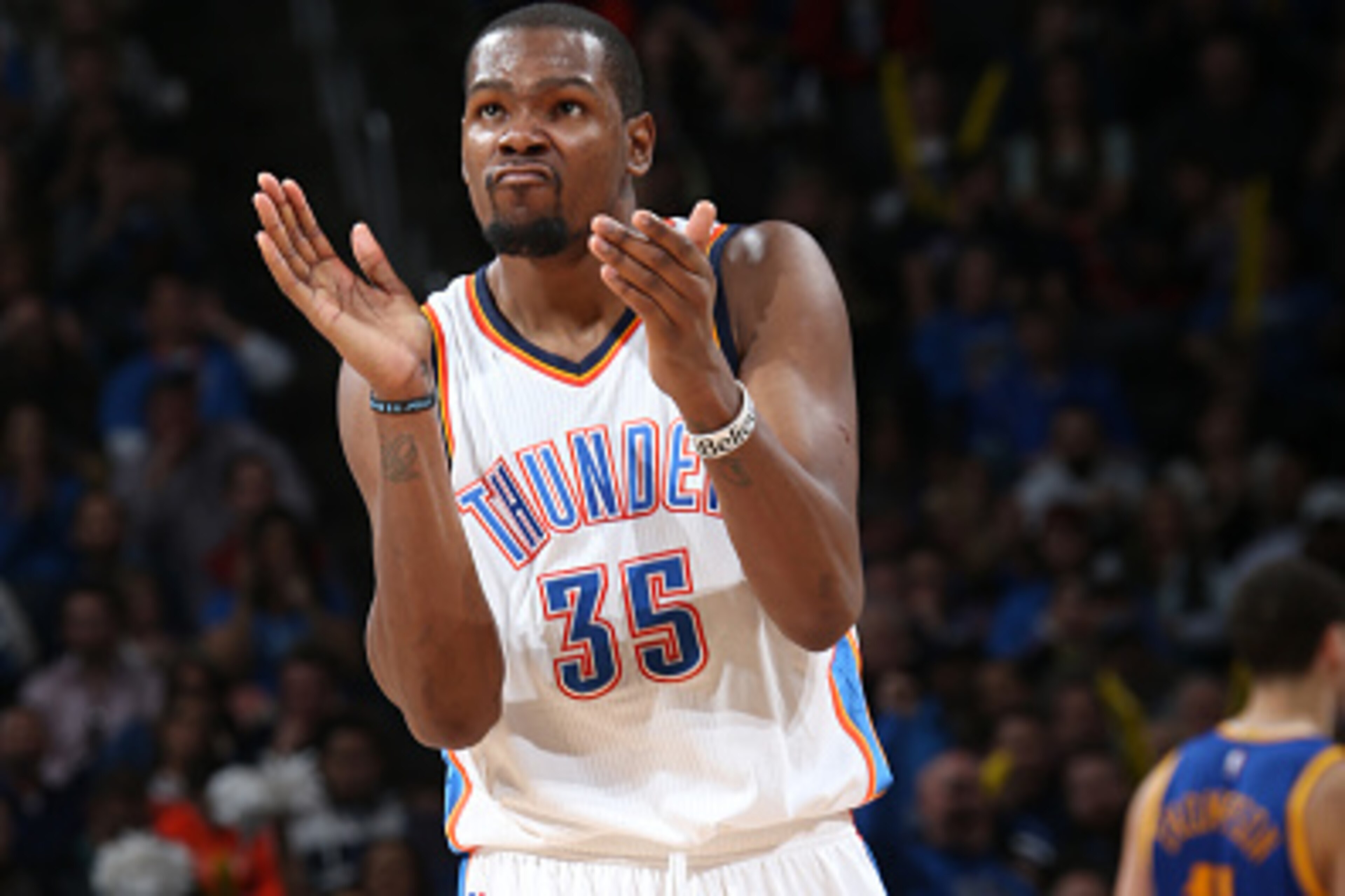 OKLAHOMA CITY, OK- JANUARY 16: Kevin Durant #35 of the Oklahoma City Thunder celebrates during a game against the Golden State Warriors on January 16, 2015 at Chesapeake Energy Arena in Oklahoma City, OK. NOTE TO USER: User expressly acknowledges and agre