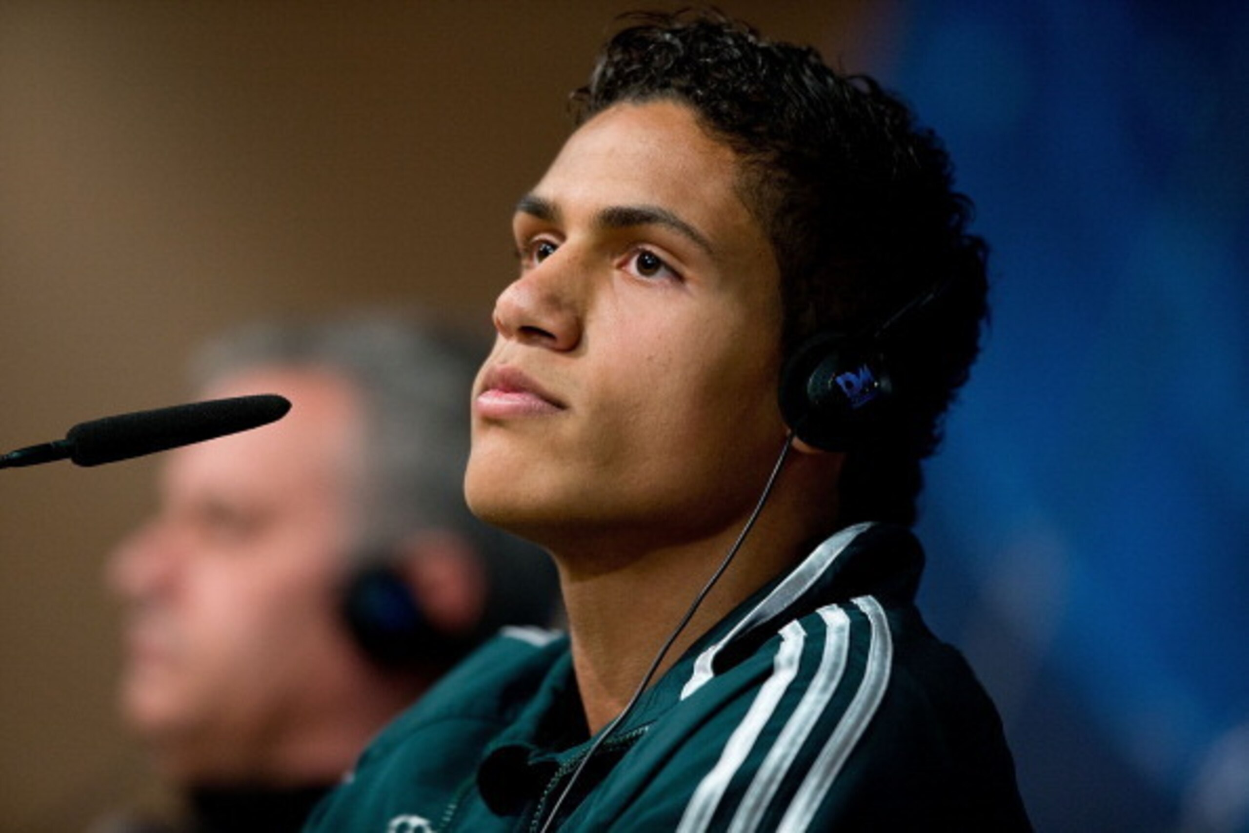 MADRID, SPAIN - APRIL 02:  Real Madrid player Raphael Varane listen to questions from the media during a press conference ahead of the UEFA Champions League Quarterfinal match between Real Madrid and Galatasaray AS at Santiago Bernabeu Stadium on April 2,