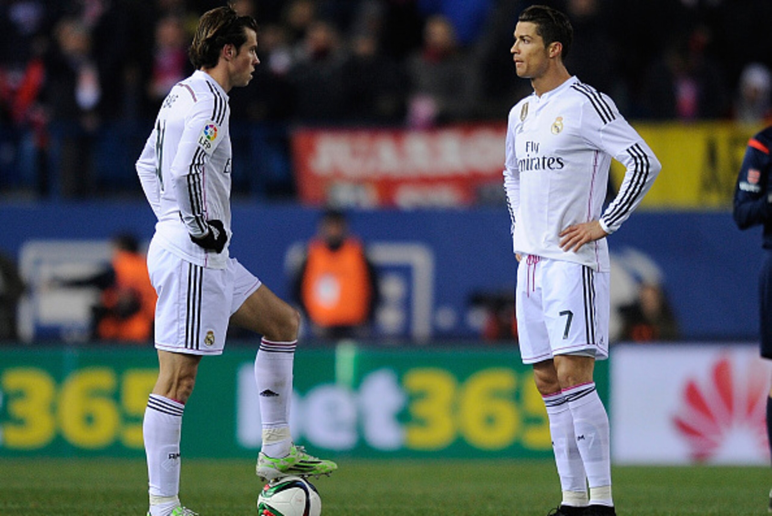 MADRID, SPAIN - JANUARY 07: Cristiano Ronaldo and Gareth Bale of Real Madrid get ready to kick off the ball after Club Atletico de Madrid scored their 2nd goal during the Copa del Rey Round of 16, First Leg match between Club Atletico de Madrid and Real MADRID, SPAIN - JANUARY 07: Cristiano Ronaldo and Gareth Bale of Real Madrid get ready to kick off the ball after Club Atletico de Madrid scored their 2nd goal during the Copa del Rey Round of 16, First Leg match between Club Atletico de Madrid and Real