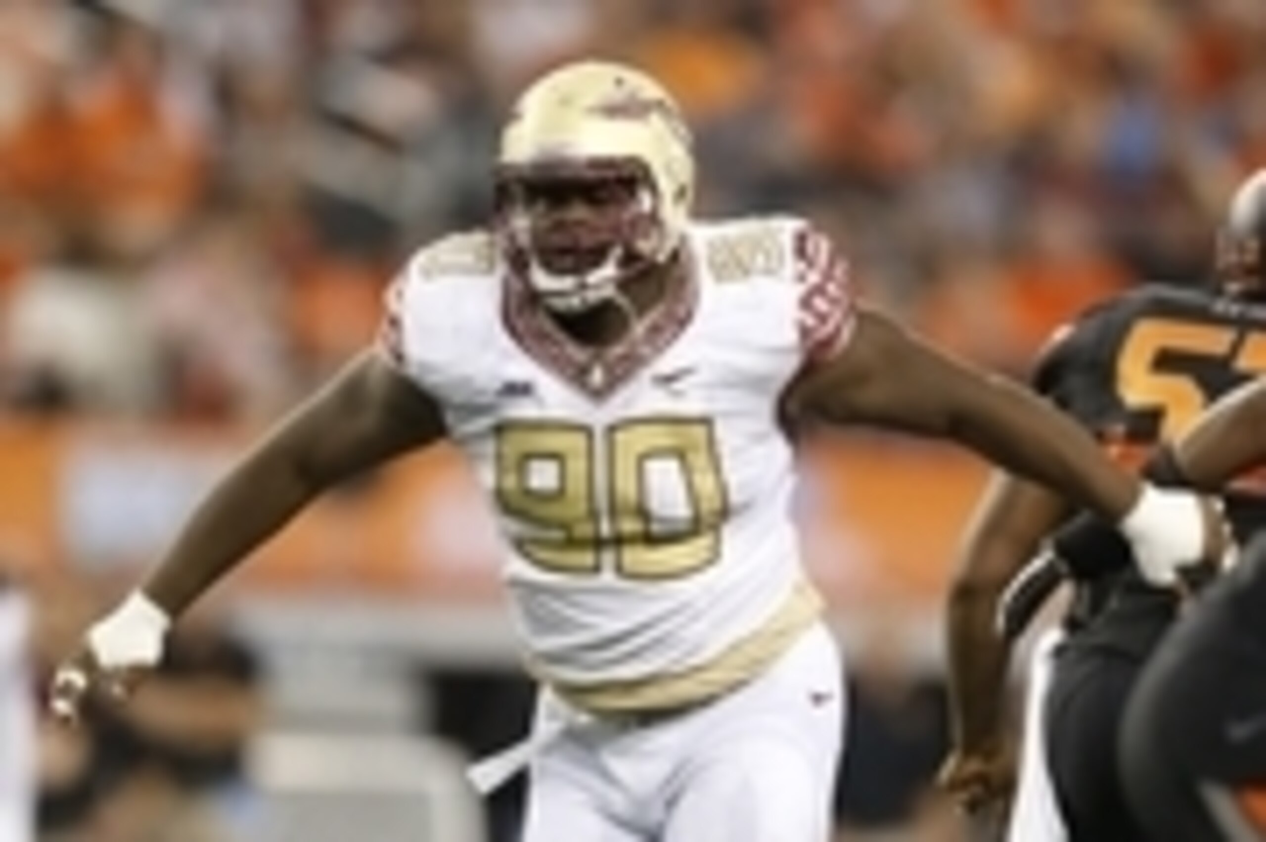 Aug 30, 2014; Arlington, TX, USA; Florida State Seminoles defensive tackle Eddie Goldman (90) in action against the Oklahoma State Cowboys at AT&T Stadium. Mandatory Credit: Matthew Emmons-USA TODAY Sports