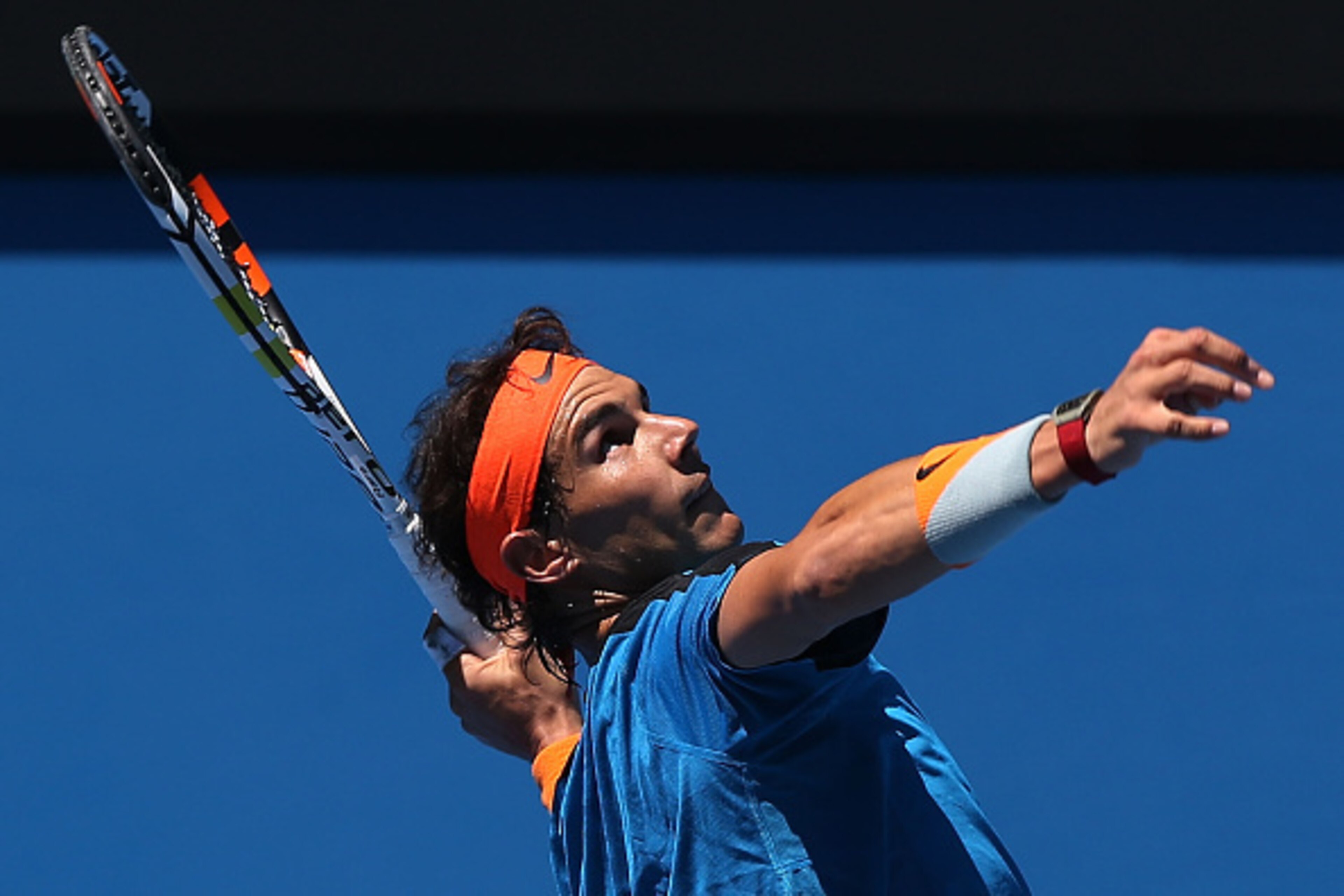 MELBOURNE, AUSTRALIA - JANUARY 16:  Rafael Nadal of Spain serves during a practice session ahead of the 2015 Australian Open at Melbourne Park on January 16, 2015 in Melbourne, Australia.  (Photo by Michael Dodge/Getty Images)