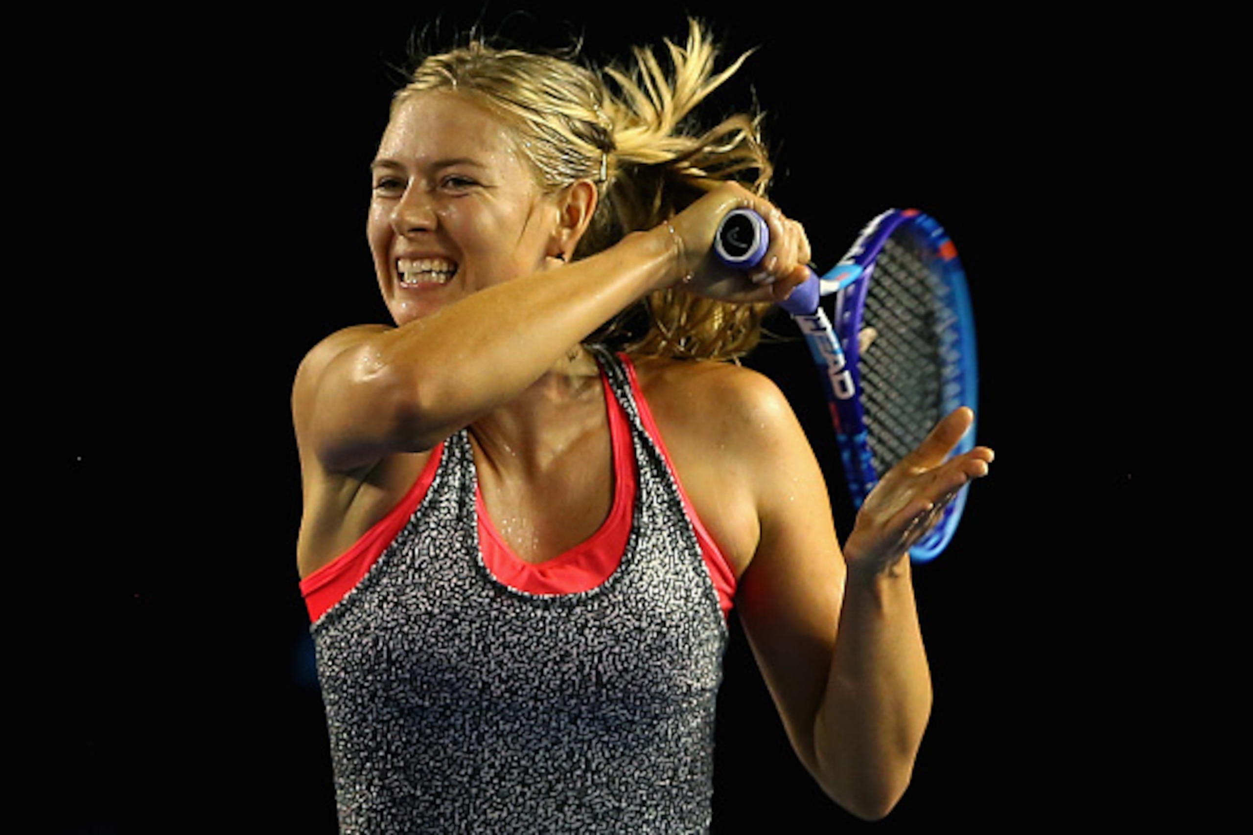 MELBOURNE, AUSTRALIA - JANUARY 13:  Maria Sharapova of Russia plays a forehand during a practice session ahead of the 2015 Australian Open at Melbourne Park on January 13, 2015 in Melbourne, Australia.  (Photo by Quinn Rooney/Getty Images)
